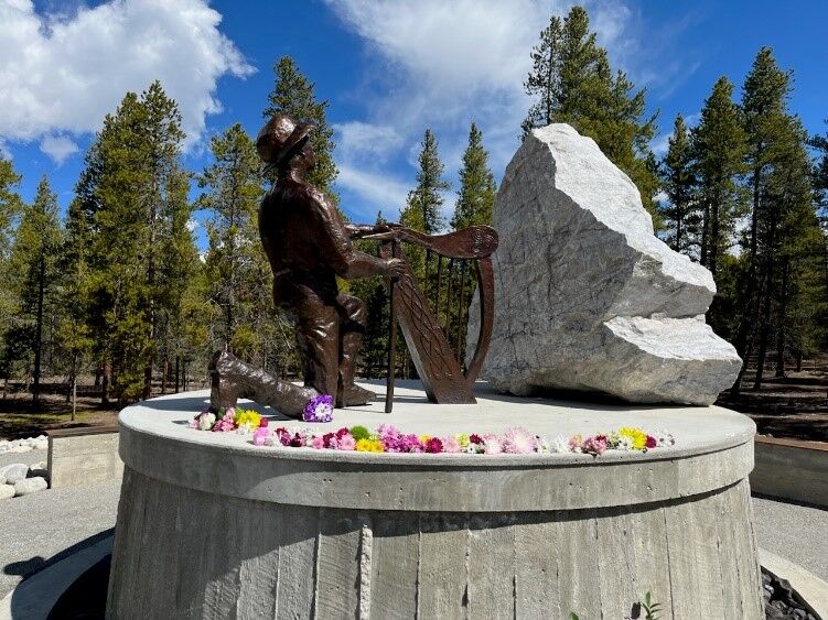 Created by Irish artist Terry Brennan and cast in bronze at Bronze Services of Loveland, the life-sized figure of a miner on bended knee sits facing toward Ireland and represents the immigrants, laborers, and children buried here. It's called 