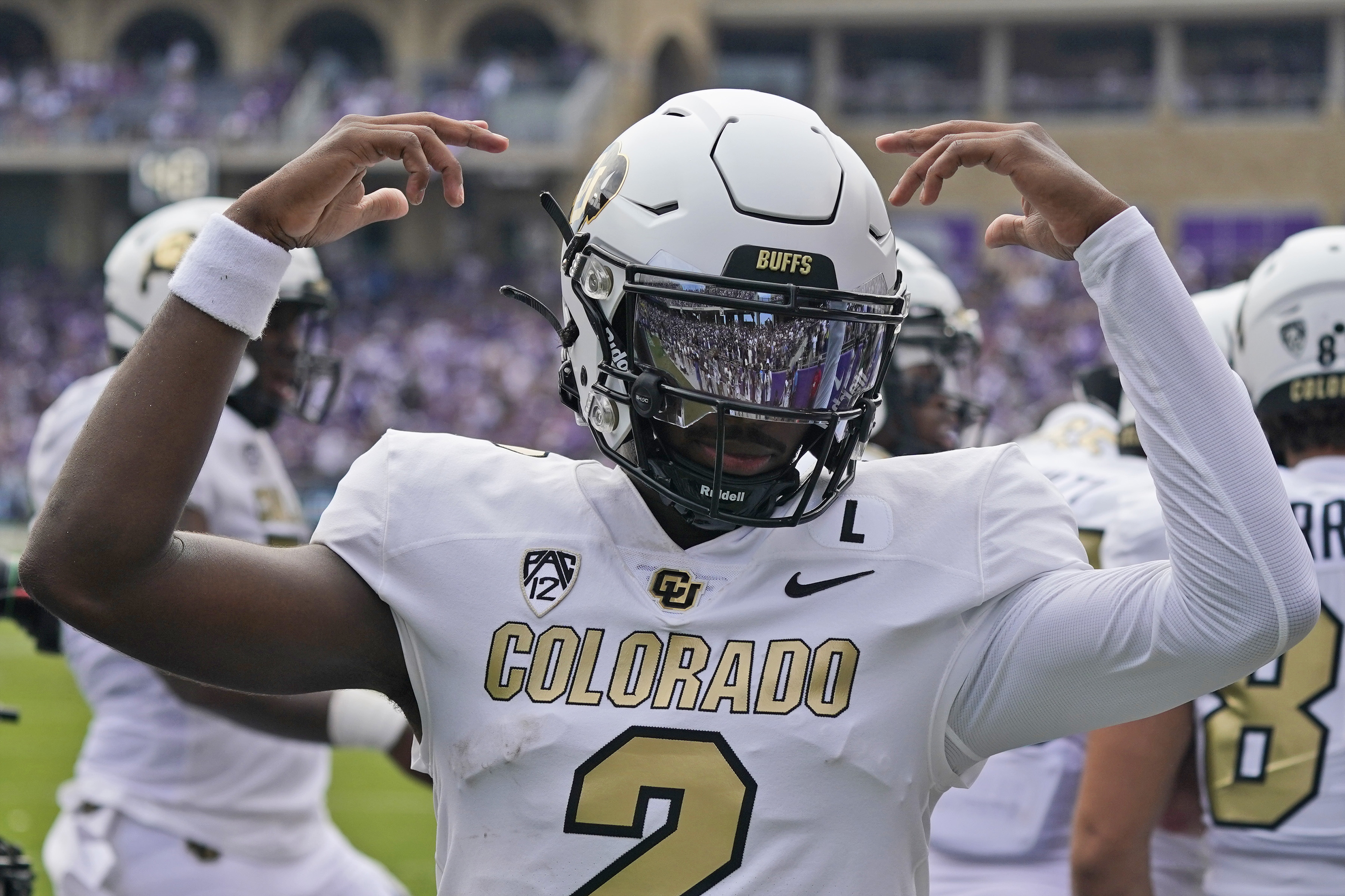 Colorado quarterback Shedeur Sanders (2) celebrates a touchdown during the first half of an NCAA college football game against TCU Saturday, Sept. 2, 2023, in Fort Worth, Texas. (AP Photo/LM Otero) (LM Otero)
