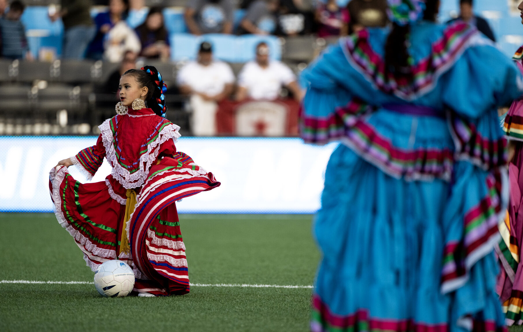 A young dancers performs before the start of a soccer game at Weidner Field on Saturday, Sept. 23, 2023. (Parker Seibold, The Gazette) (Parker Seibold)