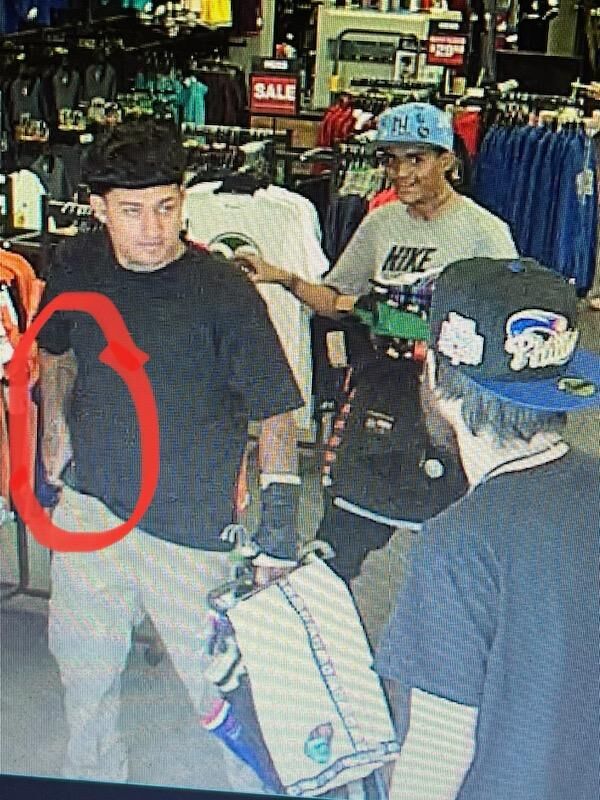 Aurora Police are looking for three of four suspects who robbed a sports good store in Southlands Shopping Center in Aurora, and others in Thornton and Longmont. They drove a stolen Chevy Tahoe with license plates 333-ZTH, and walked out of stores with armloads of merchandise after flashing guns. In one incident, a gun was fired in a parking lot as the suspects fled. (Aurora Police Department)