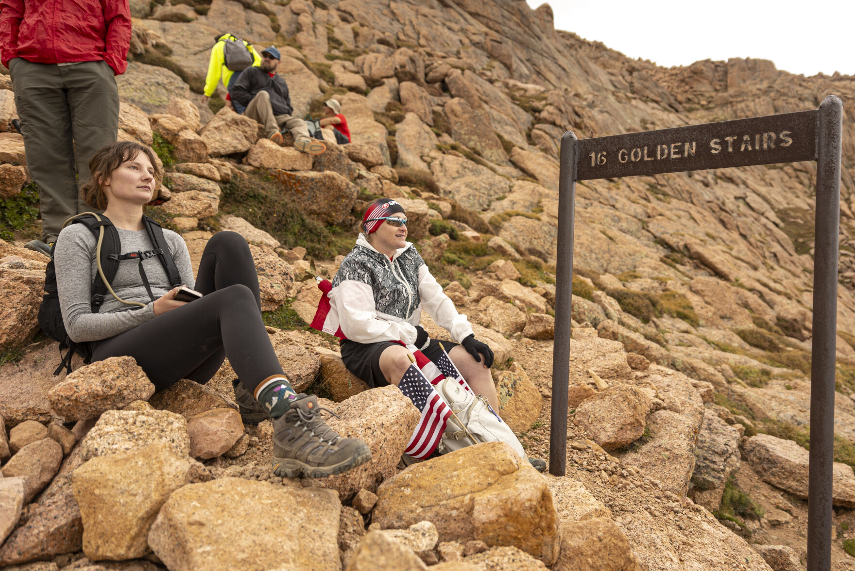 Team RWB member Tori Kirk recuperates by the base of the last short section of Barr Trail called, ’16 Golden Stairs,’ on Sunday, September 10, 2023. (Gabi Broekema)