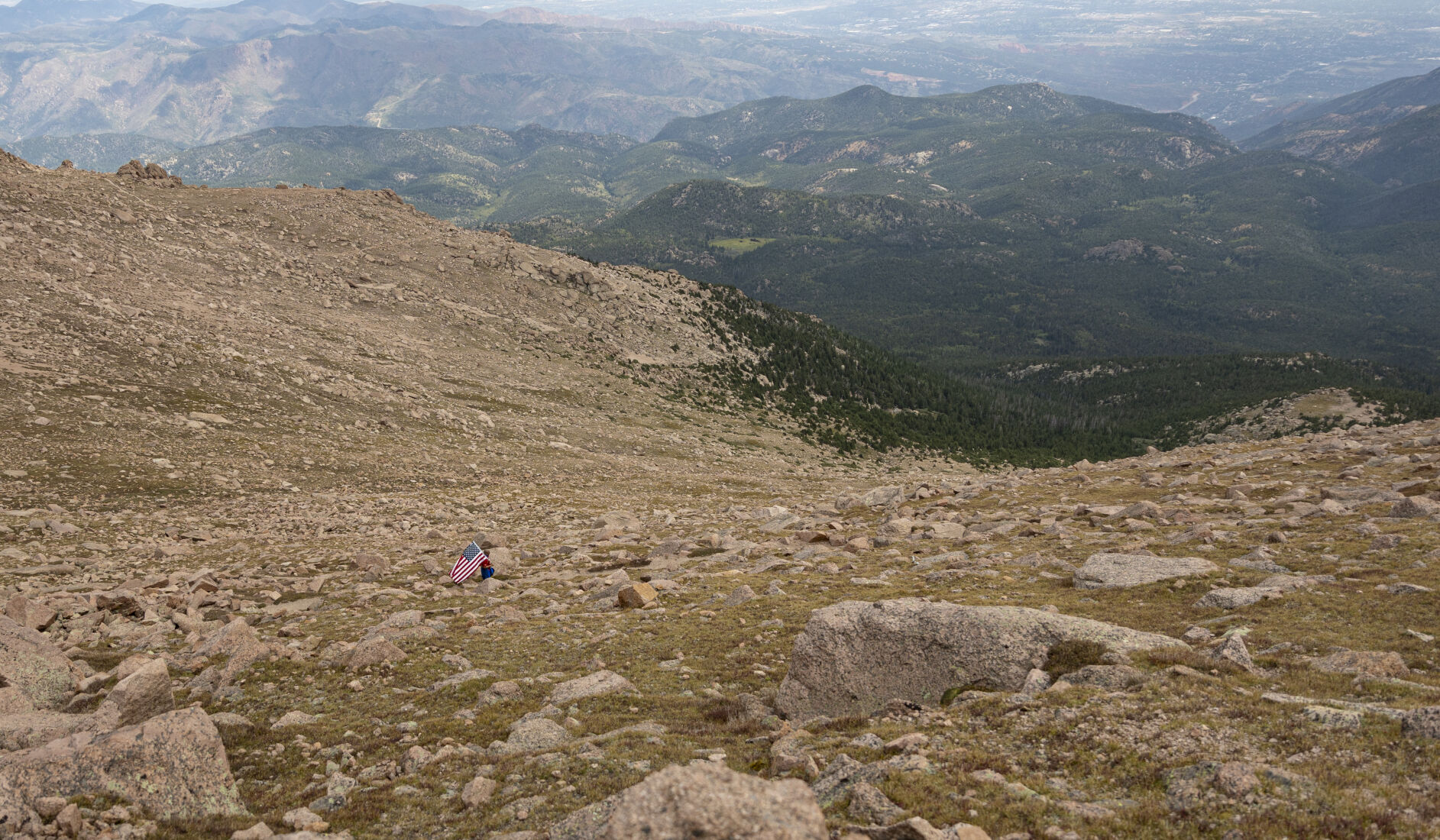 Nonprofit Team Red, White & Blue members head to the Cirque corner on the last leg of the Barr Trail on Pikes Peak during their annual 9/11 Climb of Pikes Peak on Sunday, September 10, 2023. This section of Team RWB members have been doing this hike in remembrance of 9/11 for the past six years. (Gabi Broekema)