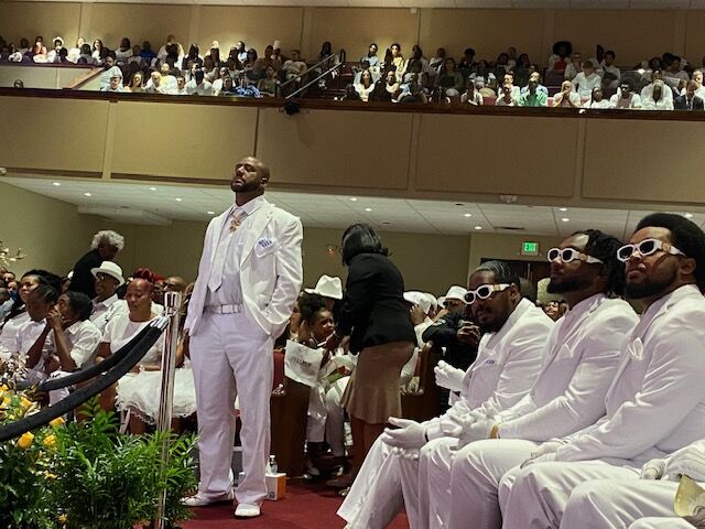Lumumba Sayers Sr. stood facing the body of his son for almost four hours during the celebration of life. (Carol McKinley/Denver Gazette)