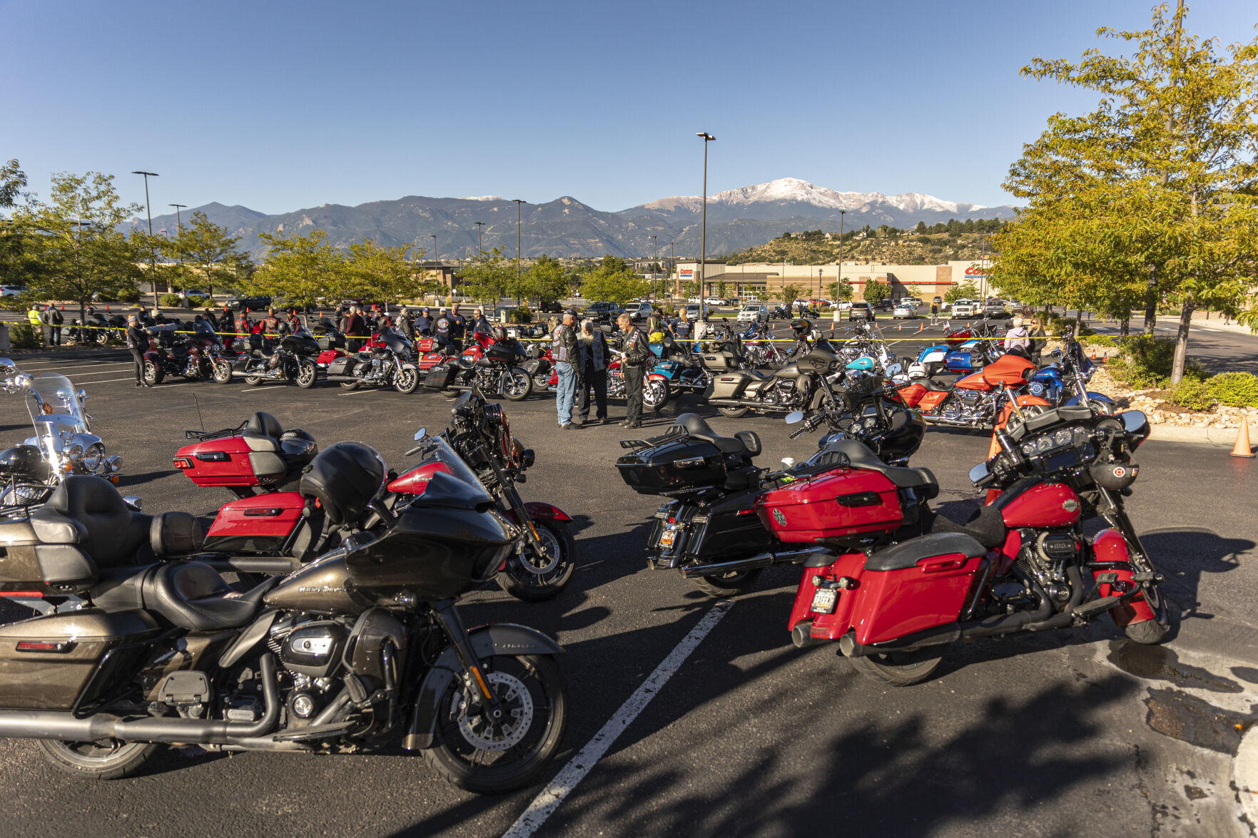 Motorcycle riders and fire trucks young and old meet at University Village Shopping Center to prepare for the Ride of Honor, where they will drive about 5 miles to the Fallen Fire Fighter Memorial 2023 Observance in Memorial Park on Saturday, September 16, 2023. (Gabi Broekema)