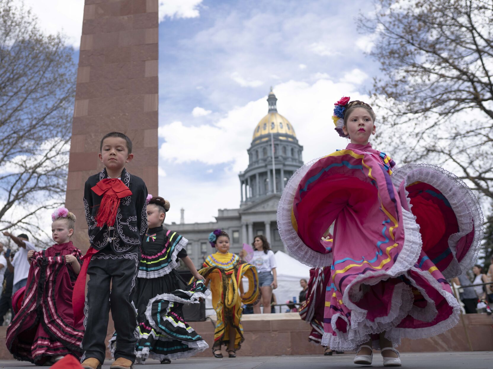 FILE PHOTO: Children perform in front of the Capitol at Civic Center Park during the Cinco de Mayo celebration on Saturday, May 7, 2022, in Denver. Aurora celebrates 