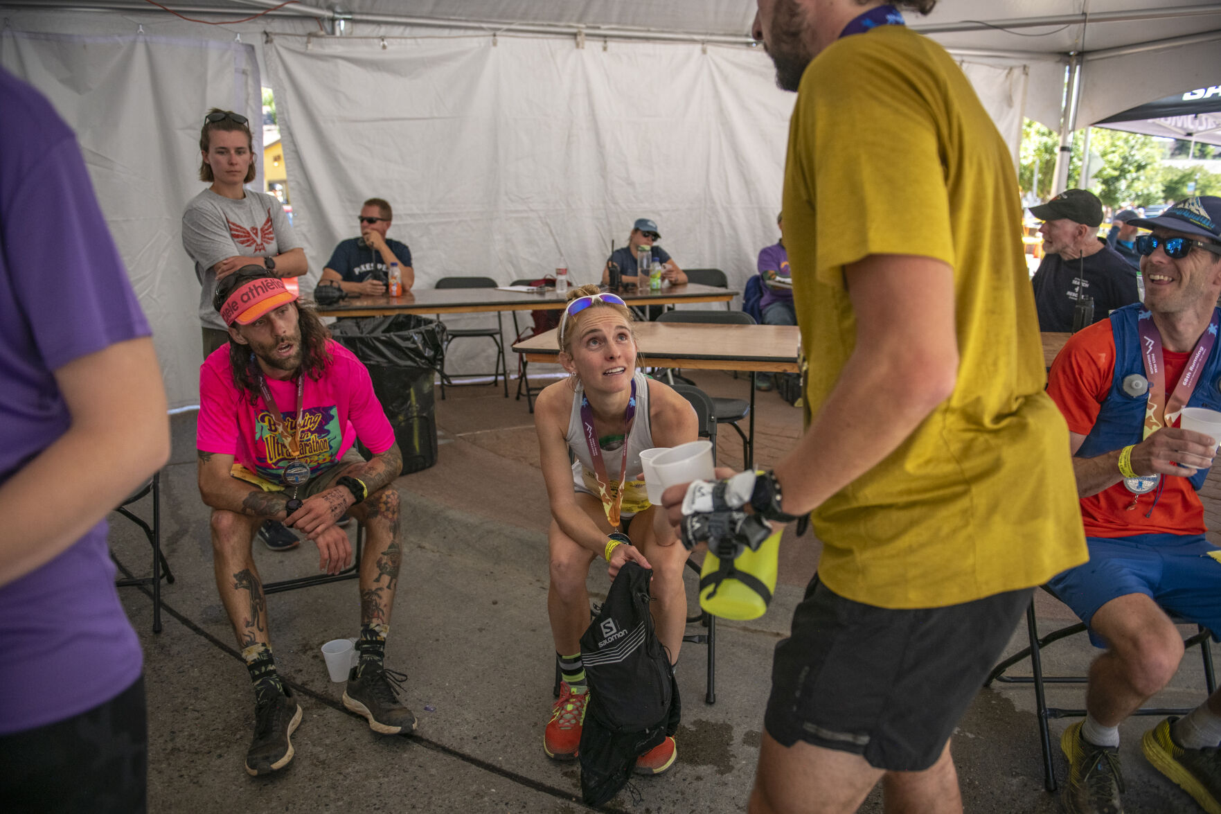 Pikes Peak Marathon 2023 overall woman runner-up Sarah Marie Guhl congratulates runners as they make their way into thew cool down tent in Manitou Springs on Sunday, September 17, 2023. (Gabi Broekema)