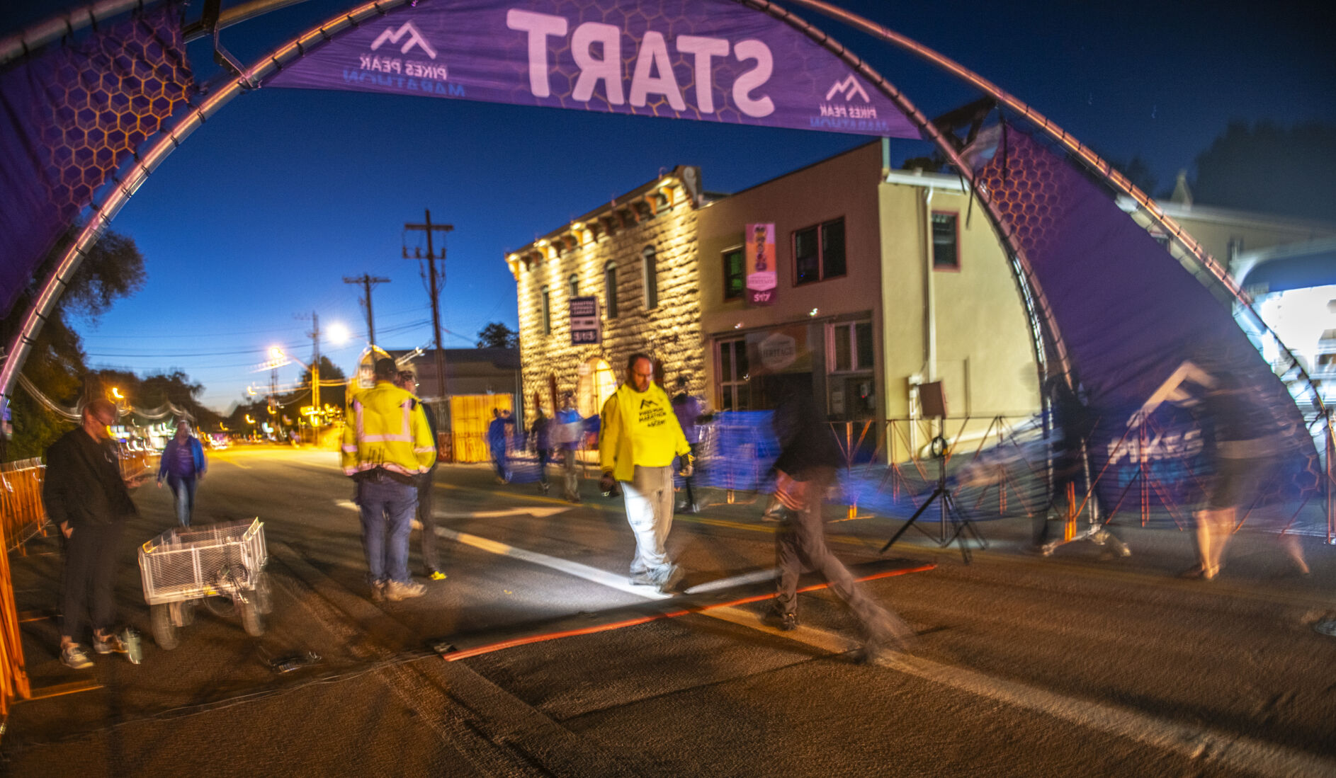 The Pikes Peak Marathon operations team works together to set up the starting line for the 68th running of the Pikes Peak Marathon in Manitou Springs on Sunday, September 17, 2023. (Gabi Broekema)