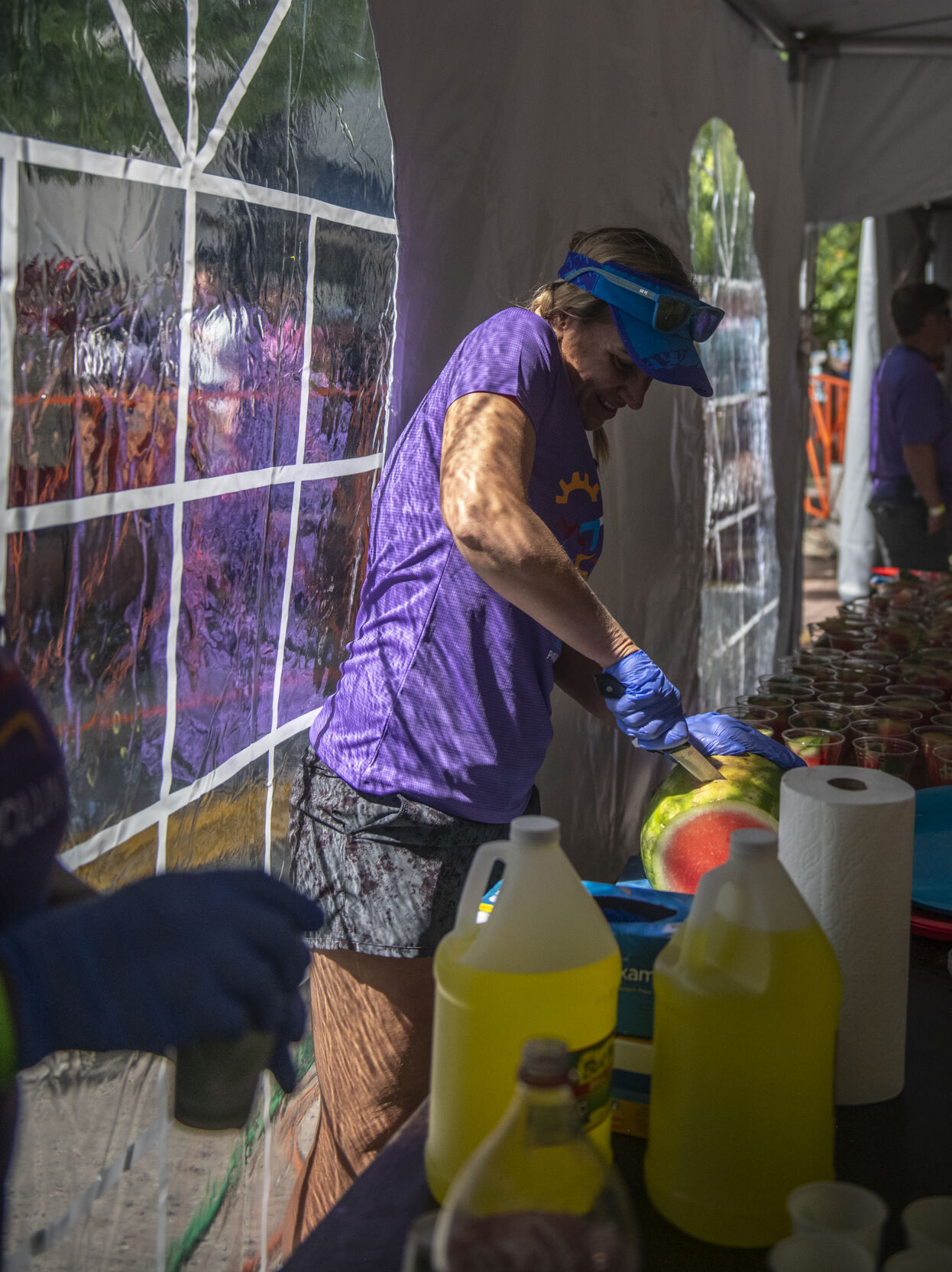 Pikes Peak Marathon’s care team provided watermelon and fluids to help rehabilitate the drained runners at the cool down tent in Manitou Springs on Sunday, September 17, 2023. (Gabi Broekema)