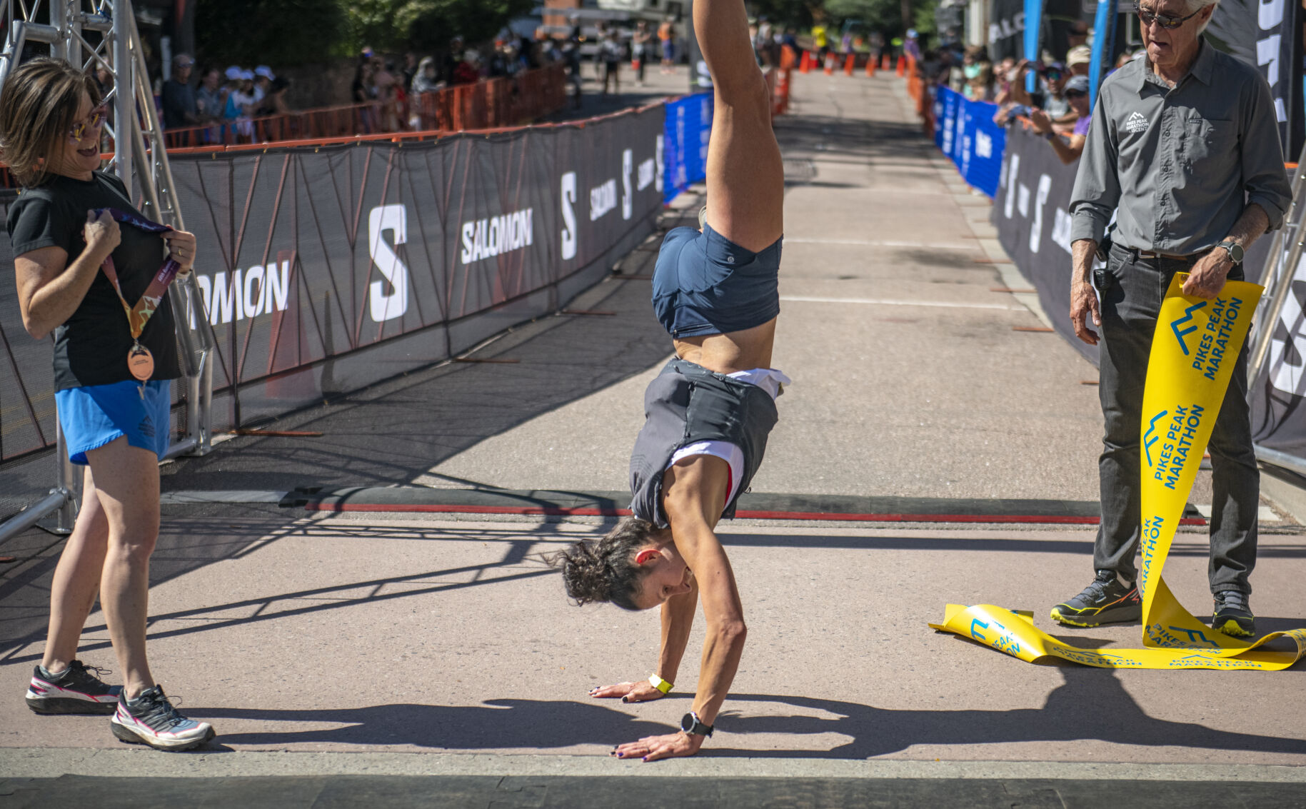 Pikes Peak Marathon 1st overall woman Kristina Mascarenas cartwheeled after crossing the finish line in Manitou Springs on Sunday, September 17, 2023. (Gabi Broekema)