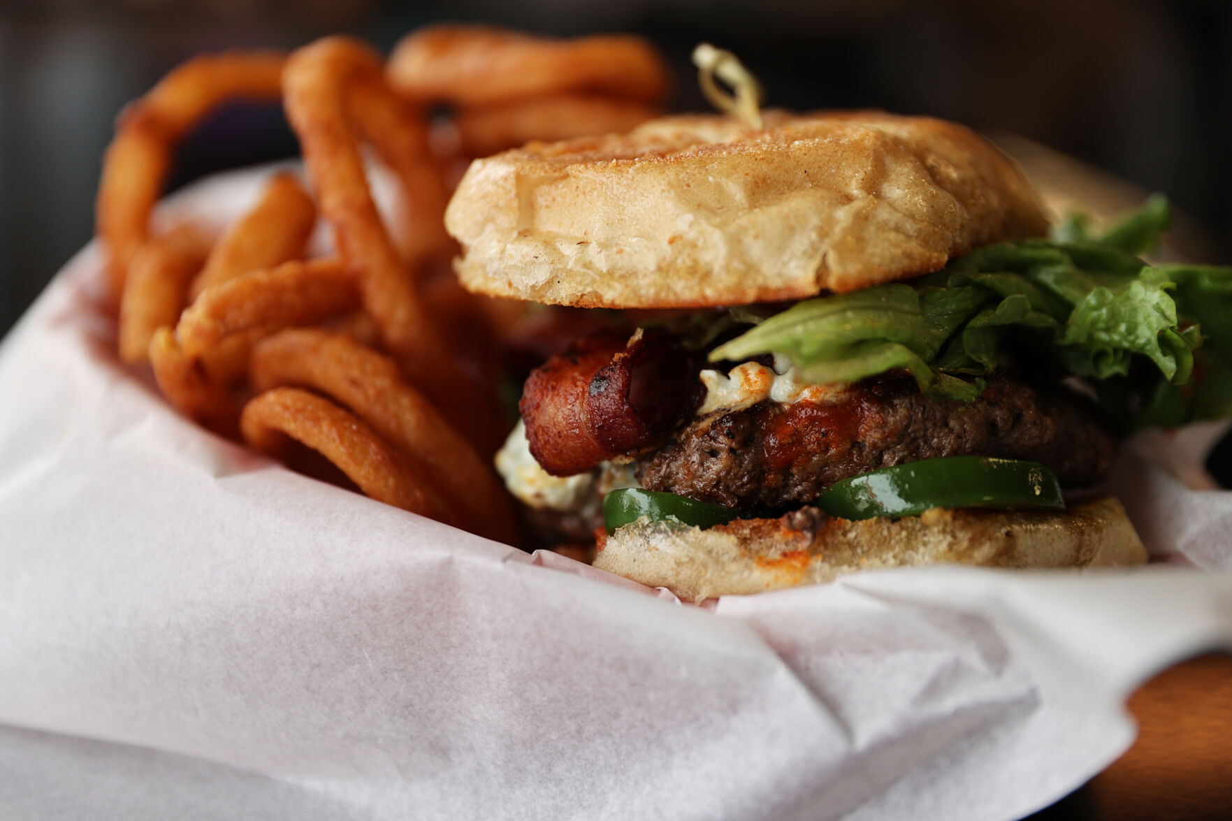 The Royal With Cheese burger with onion rings is one of the more popular burgers at the Powerstop in Gunnison. (photos by Forrest Czarnecki, the gazette)
