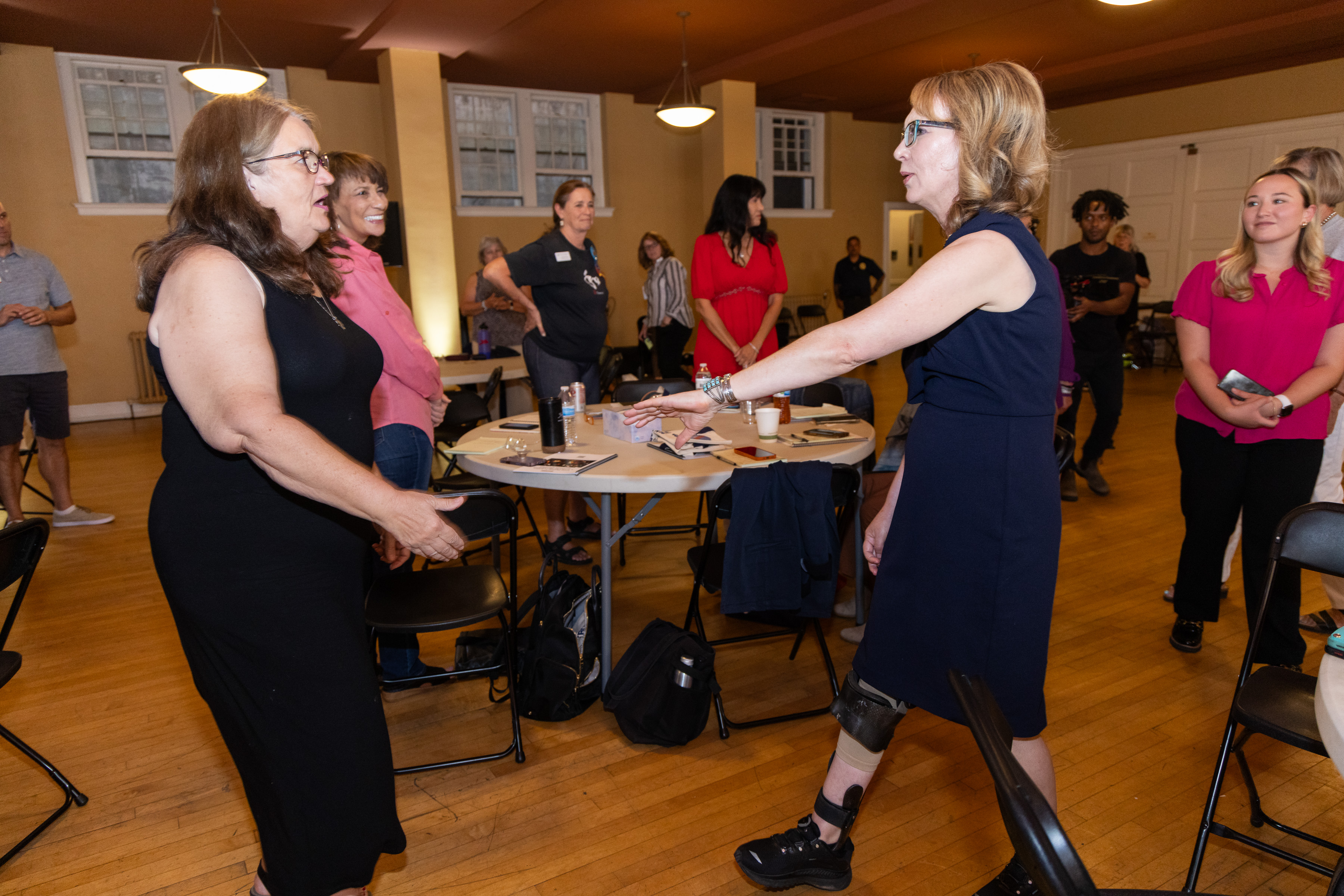 Gabby Giffords embraces Mary Reed of Tucson, Ariz. during a gun violence survivors seminar at The First Baptist Church of Denver on Friday, Sept. 8, 2023. (Liz Copan/special to The Denver Gazette) (Liz Copan/Special to The Denver Gazette)