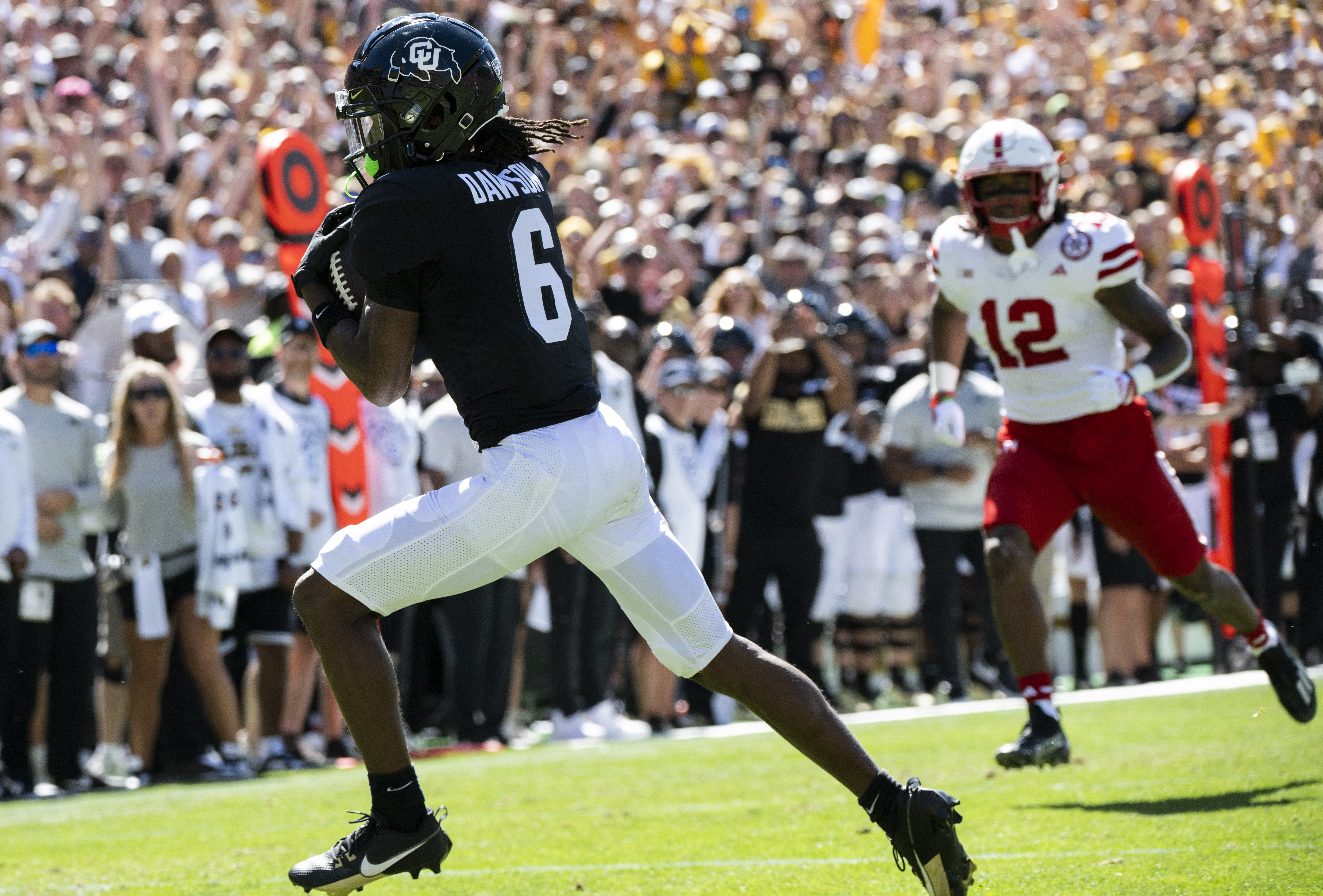 Colorado Buffaloes wide receiver Tar'Varish Dawson (6) scores on a pass from quarterback Shedeur Sanders (2) during the first half Saturday, Sept. 9, 2023, at Folsom Field in Boulder, Colo. (The Gazette, Christian Murdock) (Christian Murdock/The Gazette)