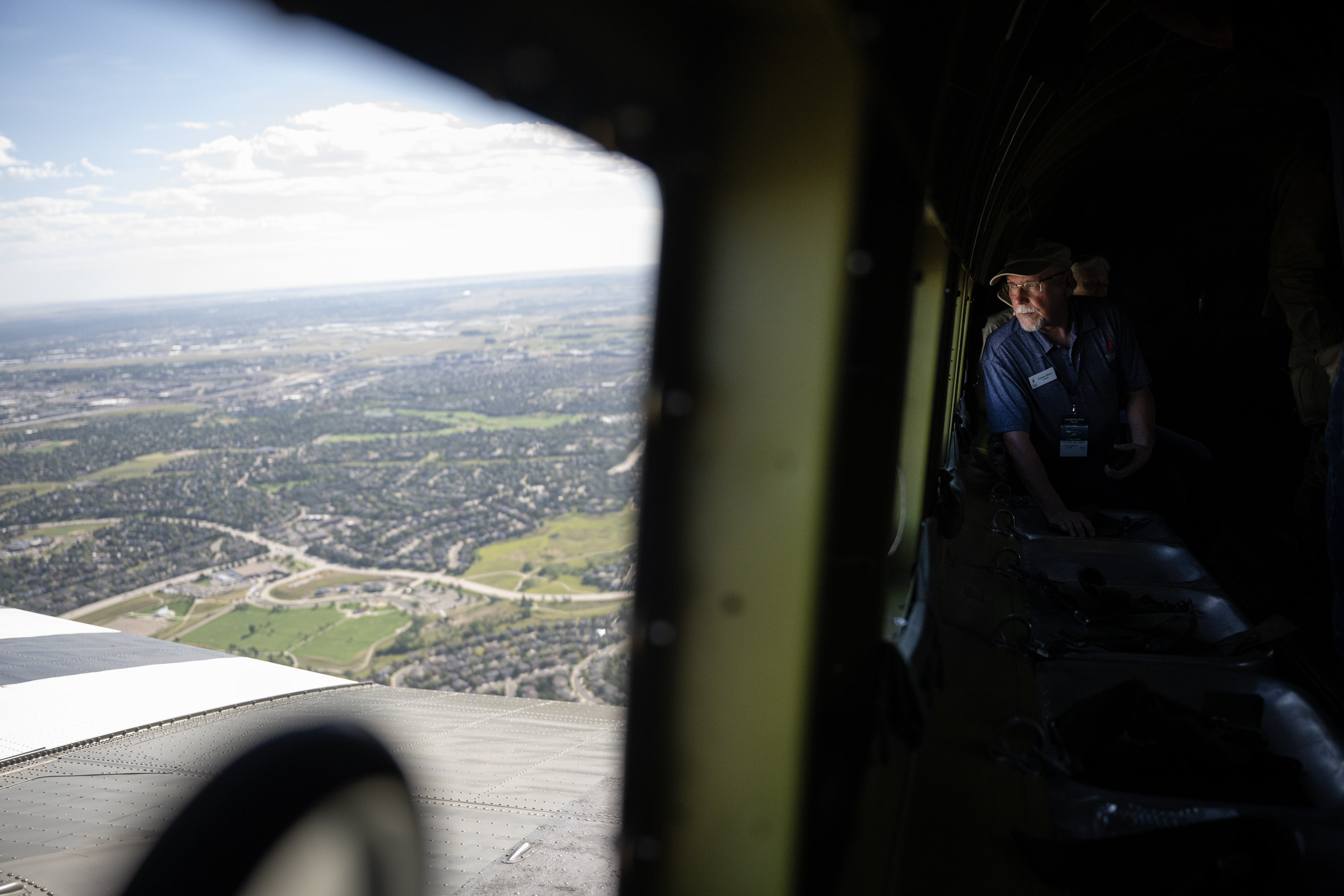 Wings Over the Rockies museum curator Chuck Stout looks out from a row of bucket seats on the C-47A Skytrain troop transport “That’s All, Brother” during a flight on Friday, Sept. 1, 2023, at Wings Over the Rockies Exploration of Flight at the Centennial Airport in Centennial, Colo. “That’s All, Brother” lead the D-Day Normandy landings in 1944. (Timothy Hurst/Denver Gazette) (TimHursttim.hurst@gazette.comhttps://secure.gravatar.com/avatar/aca82bd62b4ee425c598527cd6faa1b1?d=mm&r=g)
