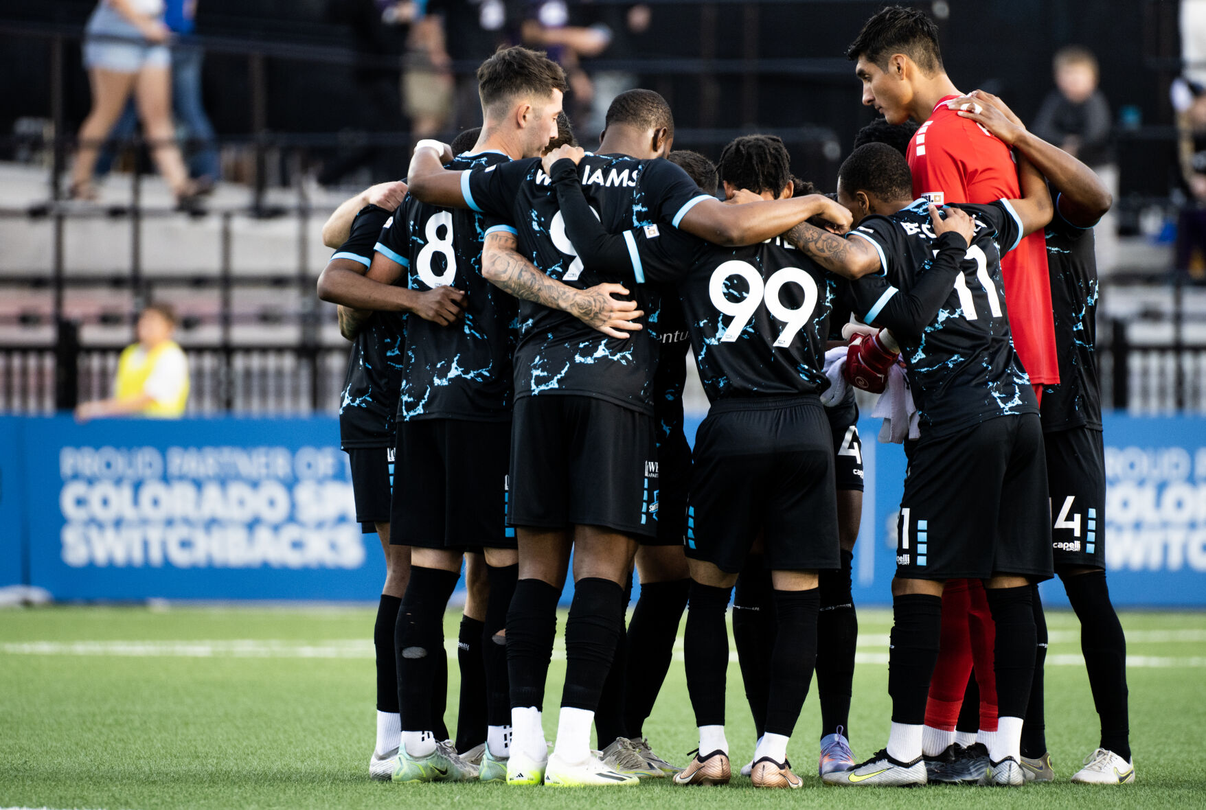 Members of the Colorado Springs Switchbacks FC huddle together before a soccer game at Weidner Field on Saturday, Sept. 23, 2023. (Parker Seibold, The Gazette) (Parker Seibold)