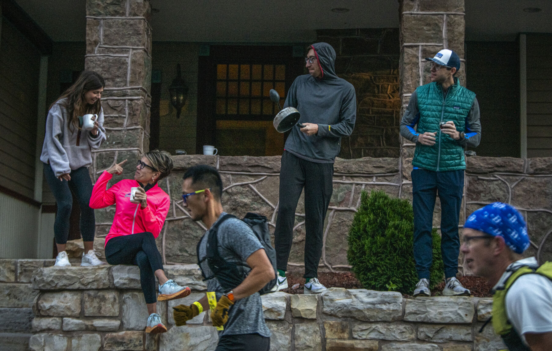 Residents of Manitou Springs cheer on runners from their front porches at the start of Pikes Peak Marathon in Manitou Springs on Sunday, September 17, 2023. (Gabi Broekema)