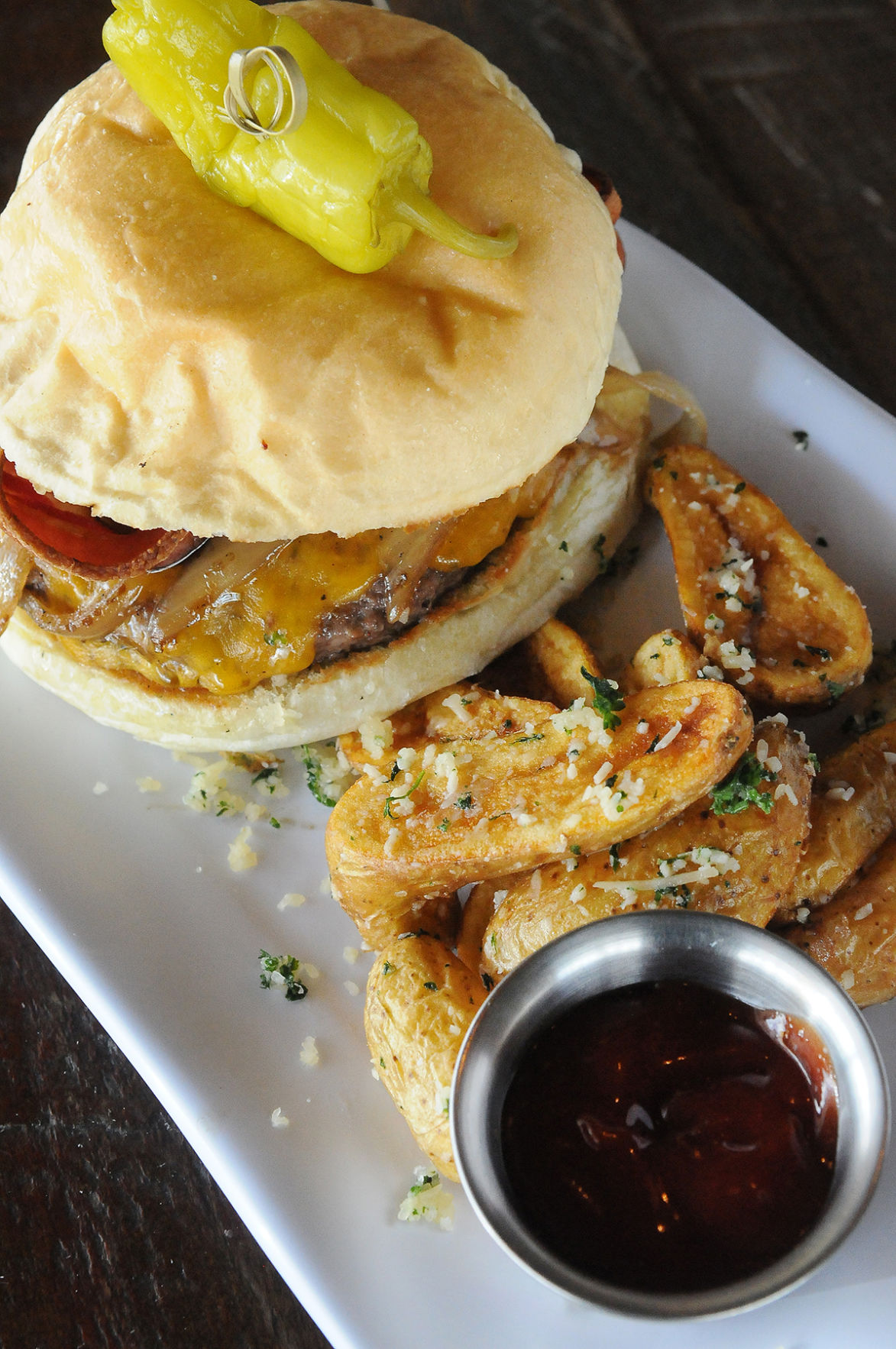 The Public House “Mountain Burger” - Colorado beef topped with whiskey caramelized onions, sharp cheddar and truffle aioli served with pub chips Wednesday October 28, 2015. Photo by Jeff Kearney (Jeff Keaerney)