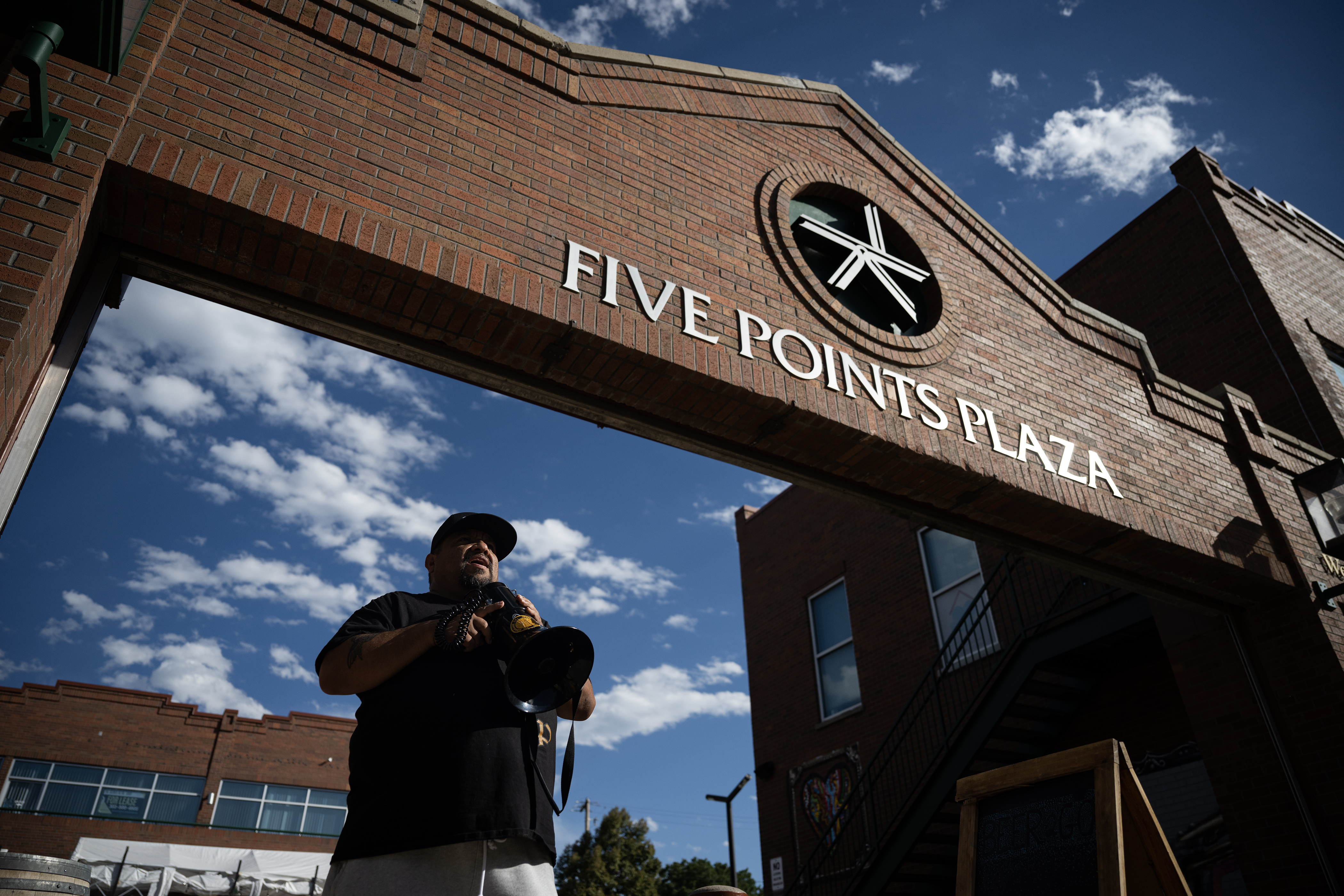 Felipe Perez, who does youth outreach work with the Gang Rescue and Support Project calls out on a megaphone for community members to come over during a “Safe Haven Activation” in response to a shooting double-homicide on Aug. 19 as seen on Thursday, Aug. 31, 2023, at Five Points Plaza in Denver. (Timothy Hurst/Denver Gazette) (TimHursttim.hurst@gazette.comhttps://secure.gravatar.com/avatar/aca82bd62b4ee425c598527cd6faa1b1?d=mm&r=g)