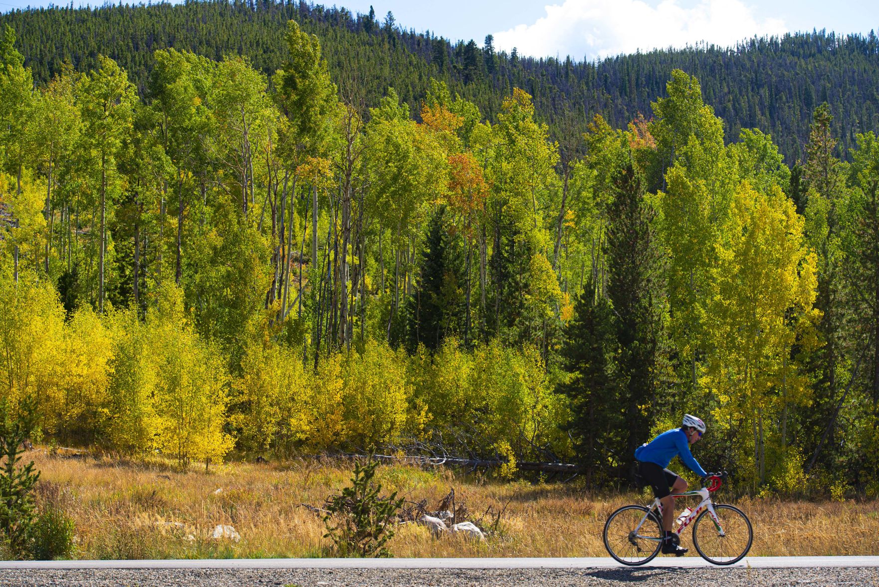 A cyclist rides the Summit County Recreational Path between Frisco and Breckenridge, Colo., Tuesday, Sept. 17, 2019, as the aspens begin to show their fall colors. (The Gazette, Christian Murdock) (CHRISTIAN MURDOCK/THE GAZETTE)