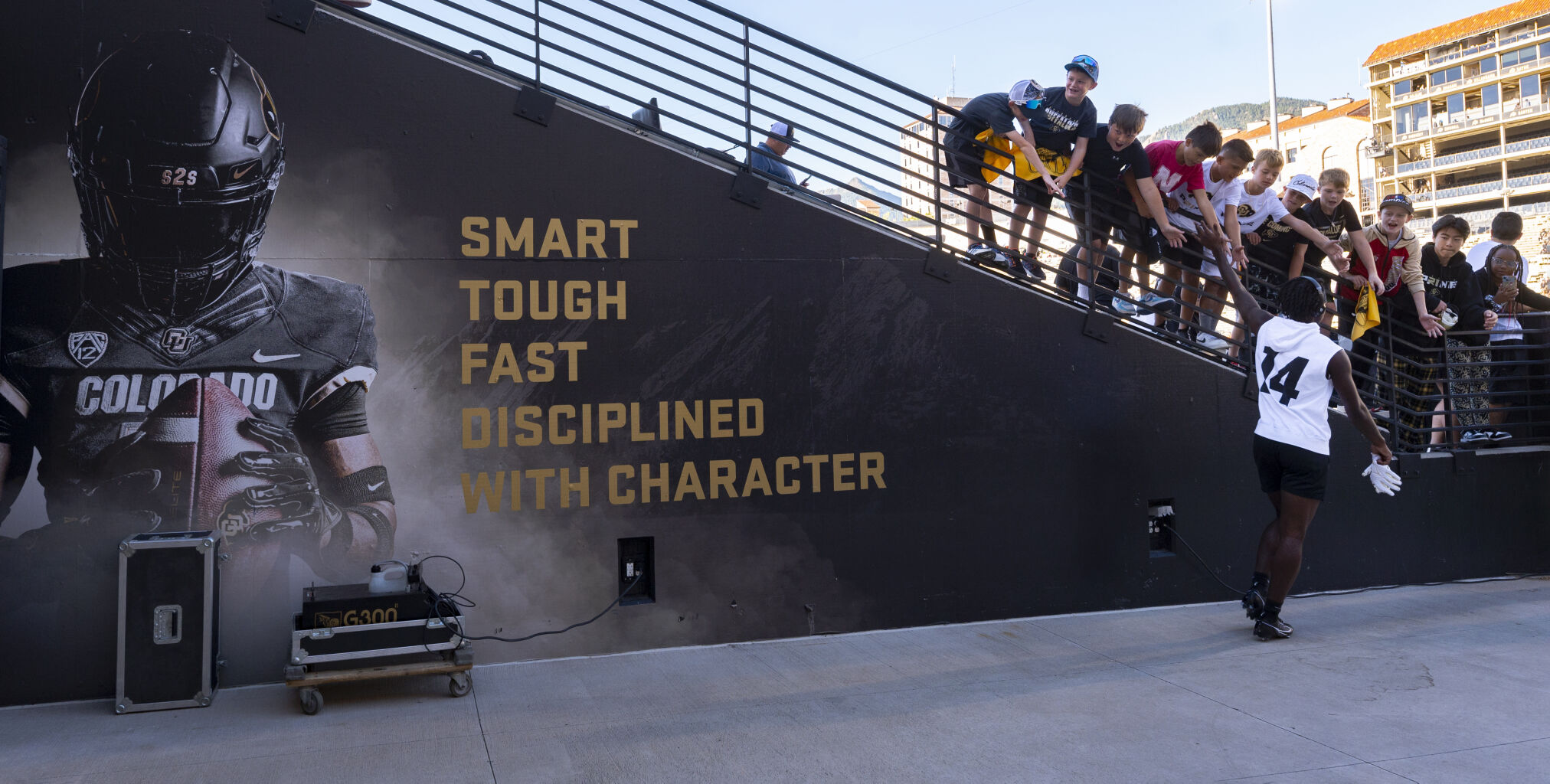 Colorado Buffaloes wide receiver Omarion Miller (14) greets fans as he runs onto the field for warm ups Saturday, Sept. 9, 2023, before Colorado's game against Nebraska at Folsom Field in Boulder, Colo. (The Gazette, Christian Murdock) (Christian Murdock/The Gazette)