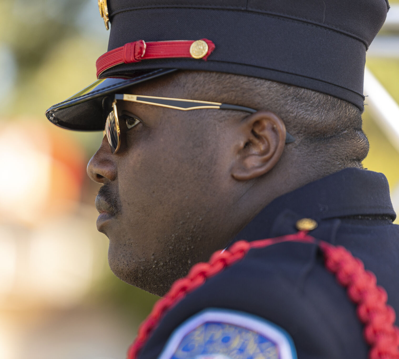 Florida’s Apopka Fire Department Honor Guard Commander Jerimiah Williams prepares to be the flag bearer for fellow fire fighter Austin Duran who died in 2022 during the Fallen Fire Fighter Memorial 2023 Observance in Memorial Park on Saturday, September 16, 2023. Commander Williams presented Duran’s family the flag during the ceremony. (Gabi Broekema)