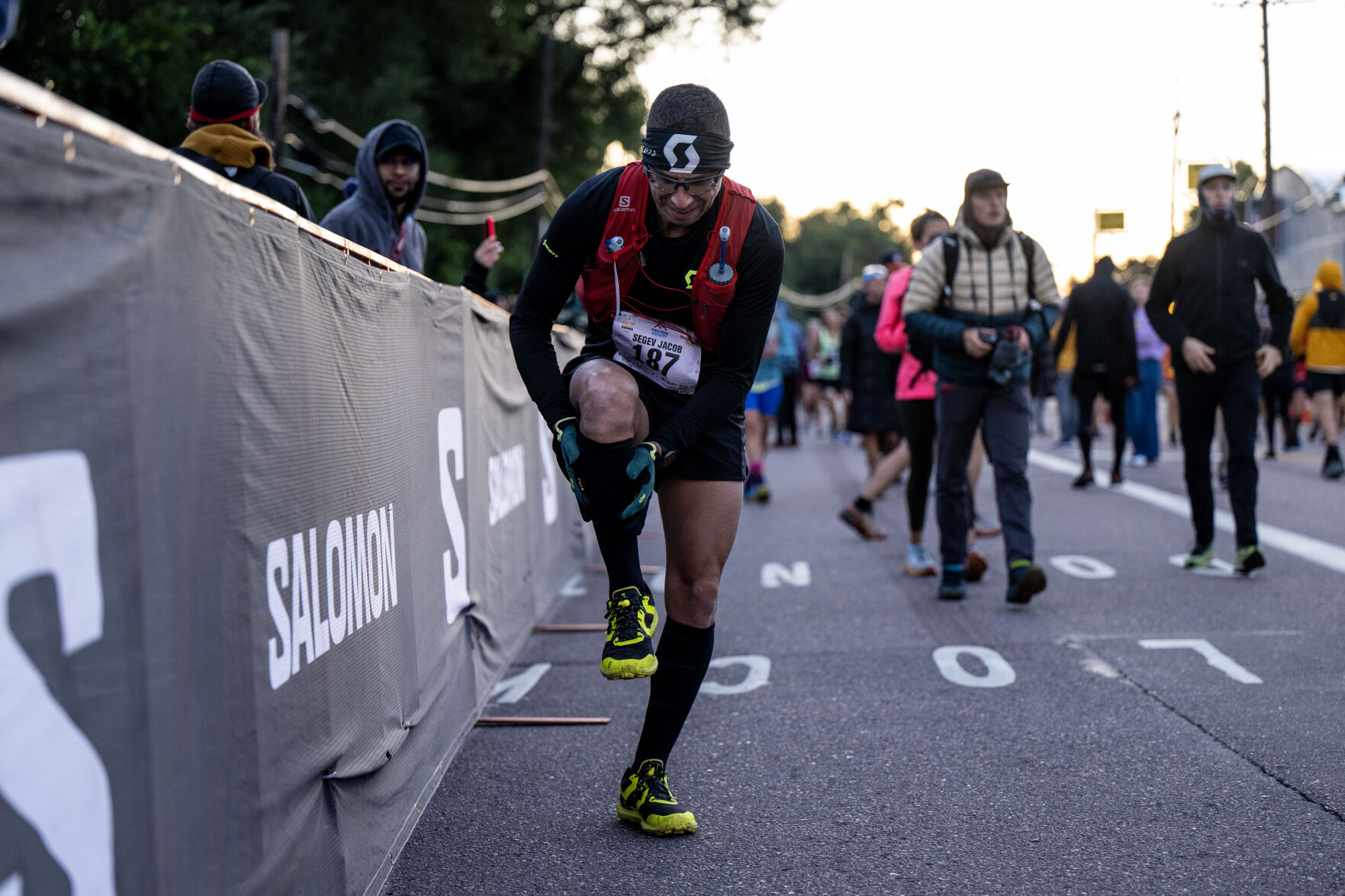 Joshua Hudson stretches before the Pikes Peak Ascent on Saturday, Sept. 16, 2023. (Parker Seibold, The Gazette) (Parker Seibold)
