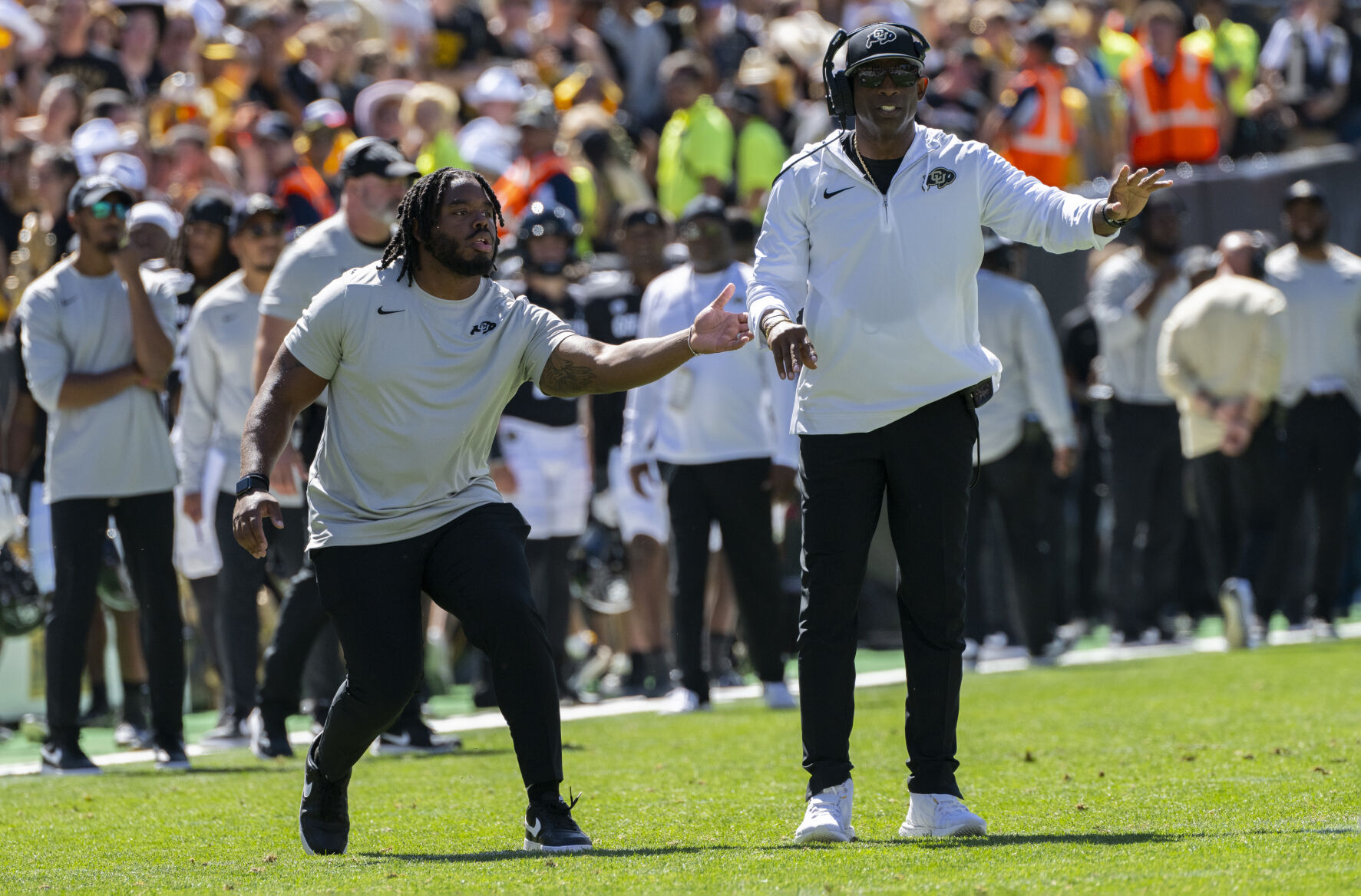 Colorado head coach Deion Sanders wonders onto the field during the Buffaloes game against the Nebraska Cornhuskers during the first half Saturday, Sept. 9, 2023, at Folsom Field in Boulder, Colo. (The Gazette, Christian Murdock) (Christian Murdock/The Gazette)