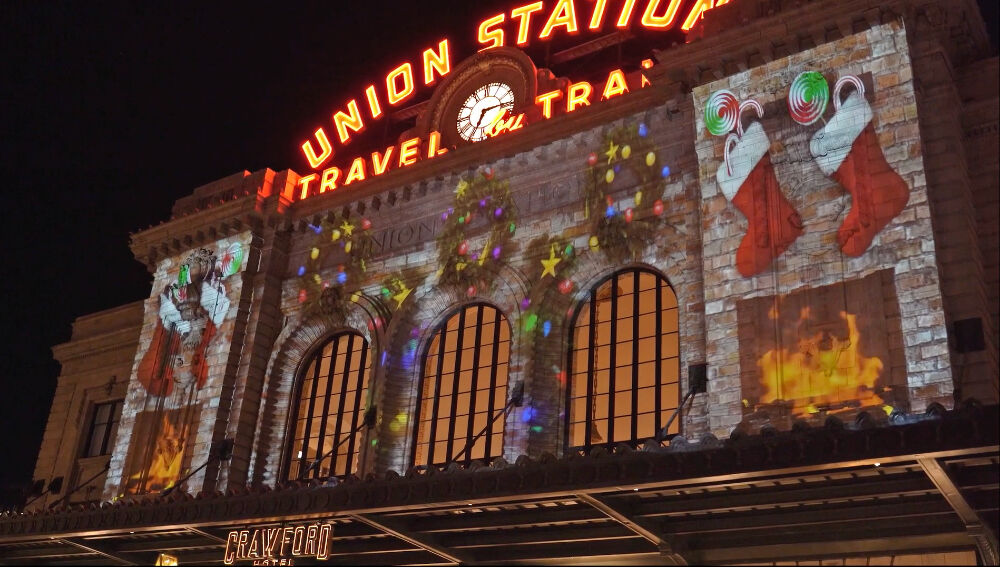 When you see holiday art overlaid atop the downtown Union Station building facade, that is the work of WAVEFORM.exp, aka Pat Higgins and Sam Moritz. (Courtesy WAVEFORM.exp)