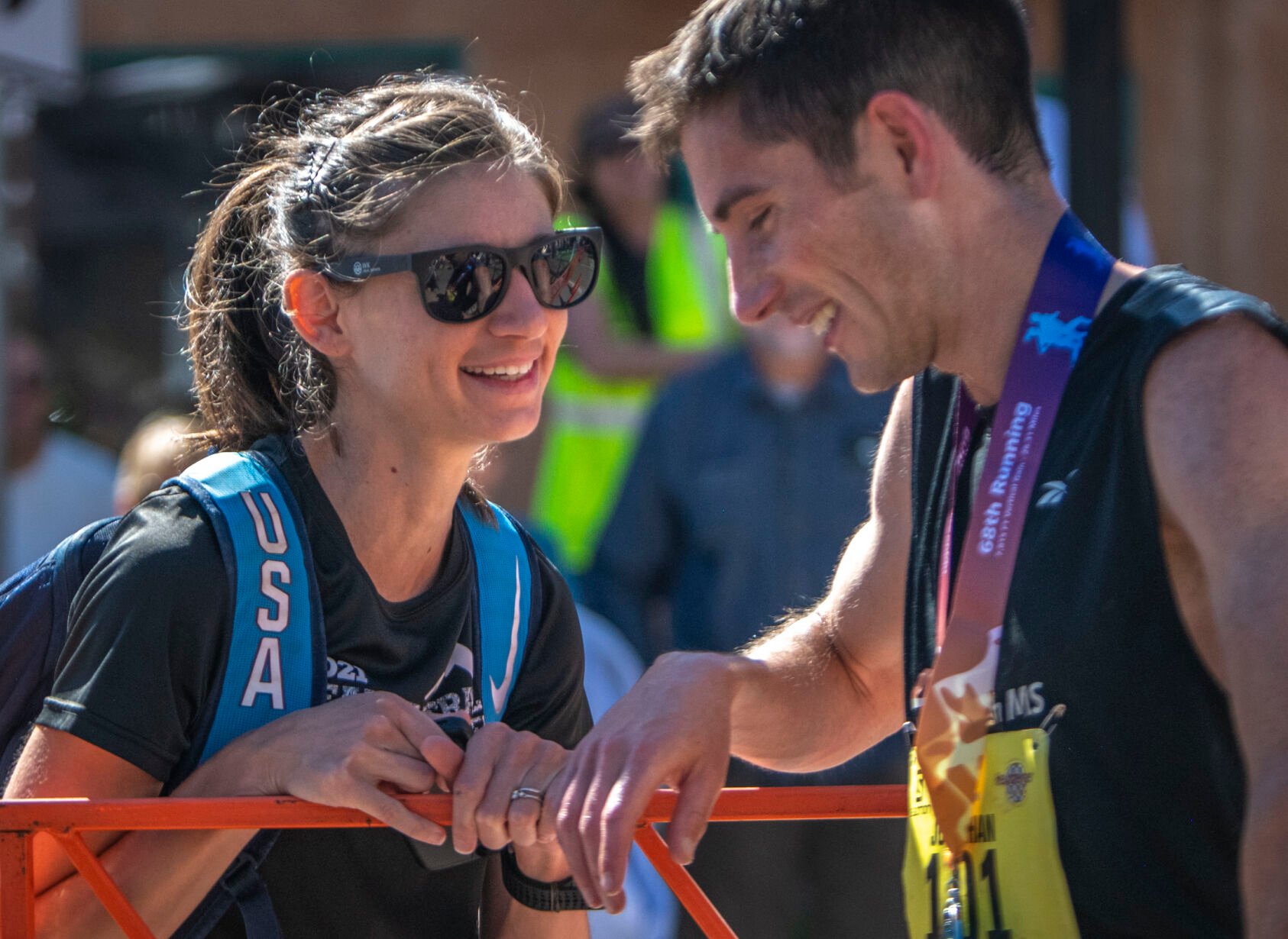 Pikes Peak Marathon 2022 Winner Jonathan Aziz hugs his wife Tara at the finish line for the 2023 Pikes Peak Marathon in Manitou Springs on Sunday, September 17, 2023. (Gabi Broekema)