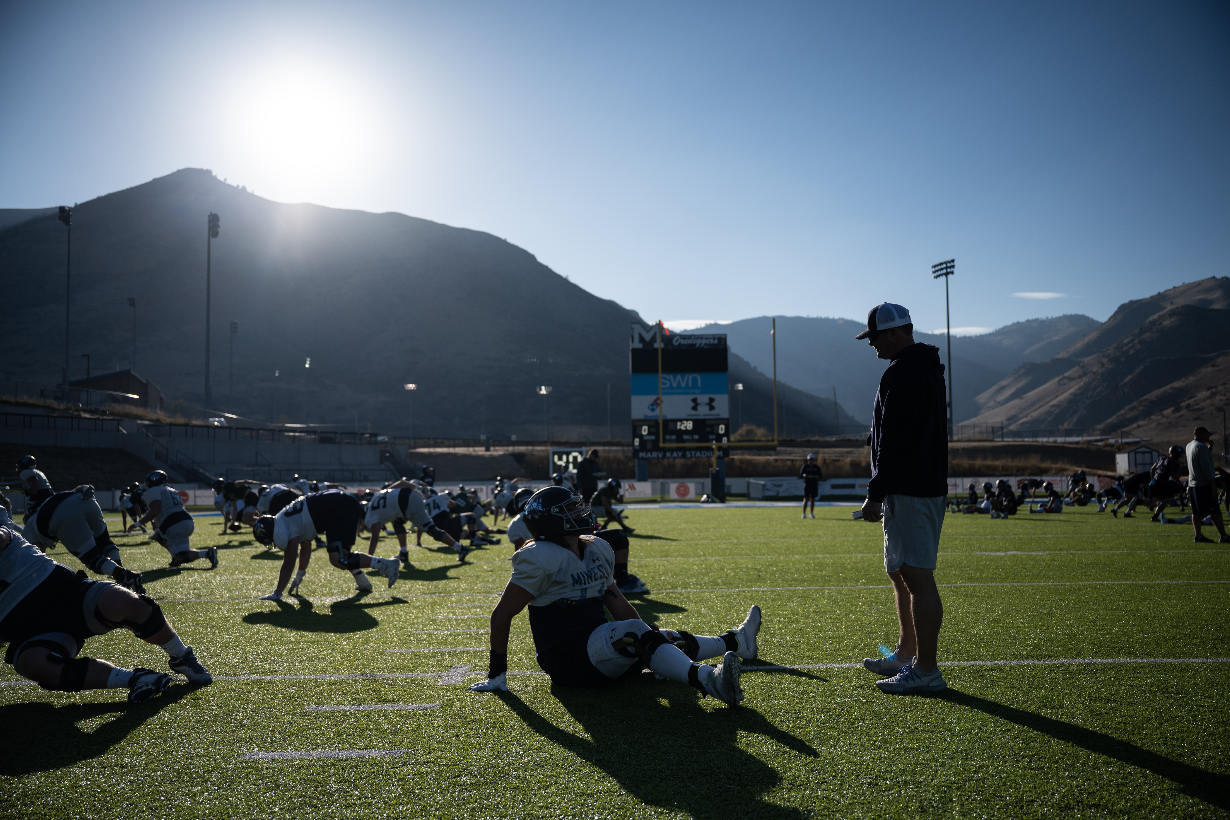 Colorado School of Mines head coach Pete Sterbick talks with redshirt offensive tackle Levi Johnson (73) during a practice on Wednesday, Oct. 25, 2023, at Marv Kay Stadium in Golden, Colo. (Timothy Hurst/Denver Gazette) (TimHursttim.hurst@gazette.comhttps://secure.gravatar.com/avatar/aca82bd62b4ee425c598527cd6faa1b1?d=mm&r=g)