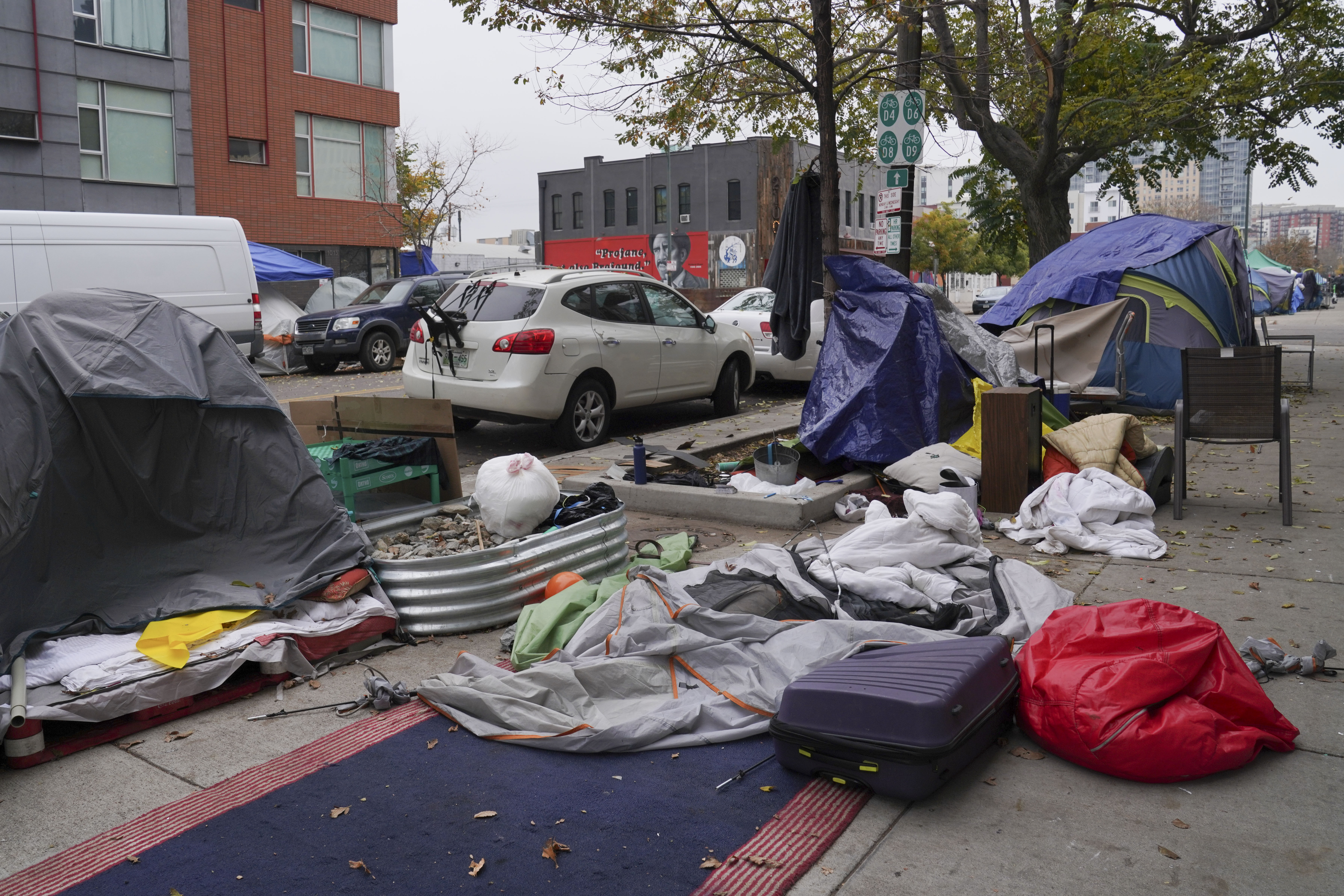 Tents line the sidewalks near 21st and Curtis Street on Thursday, Oct. 26, 2023 in Denver, Colorado. Some 50 homeless people at the encampment are being offered hotel housing as cold weather approaches, according to the mayor’s office. The city is planning to sweep the encampment. (PHOTO: Rebecca Slezak/Special to The Denver Gazette) (Rebecca Slezak)