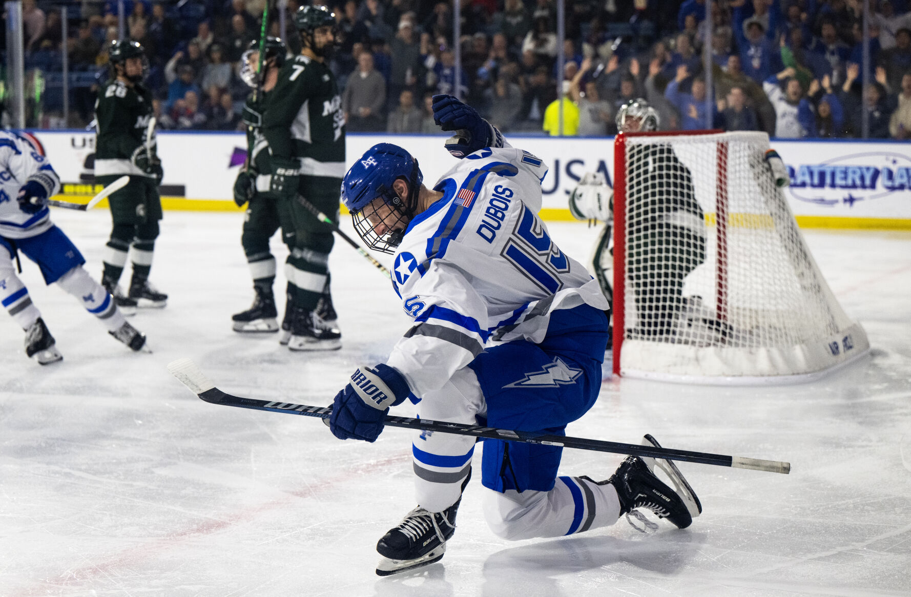 Air Force forward Owen Dubois (15) celebrates scoring his first goal as a member of the Air Force Academy hockey team in the first period of a game against Michigan State Thursday, Oct. 12, 2023, at the Cadet Ice Arena on the Air Force Academy in Colorado Springs, Colo. (Parker Seibold, The Gazette) (Parker Seibold)