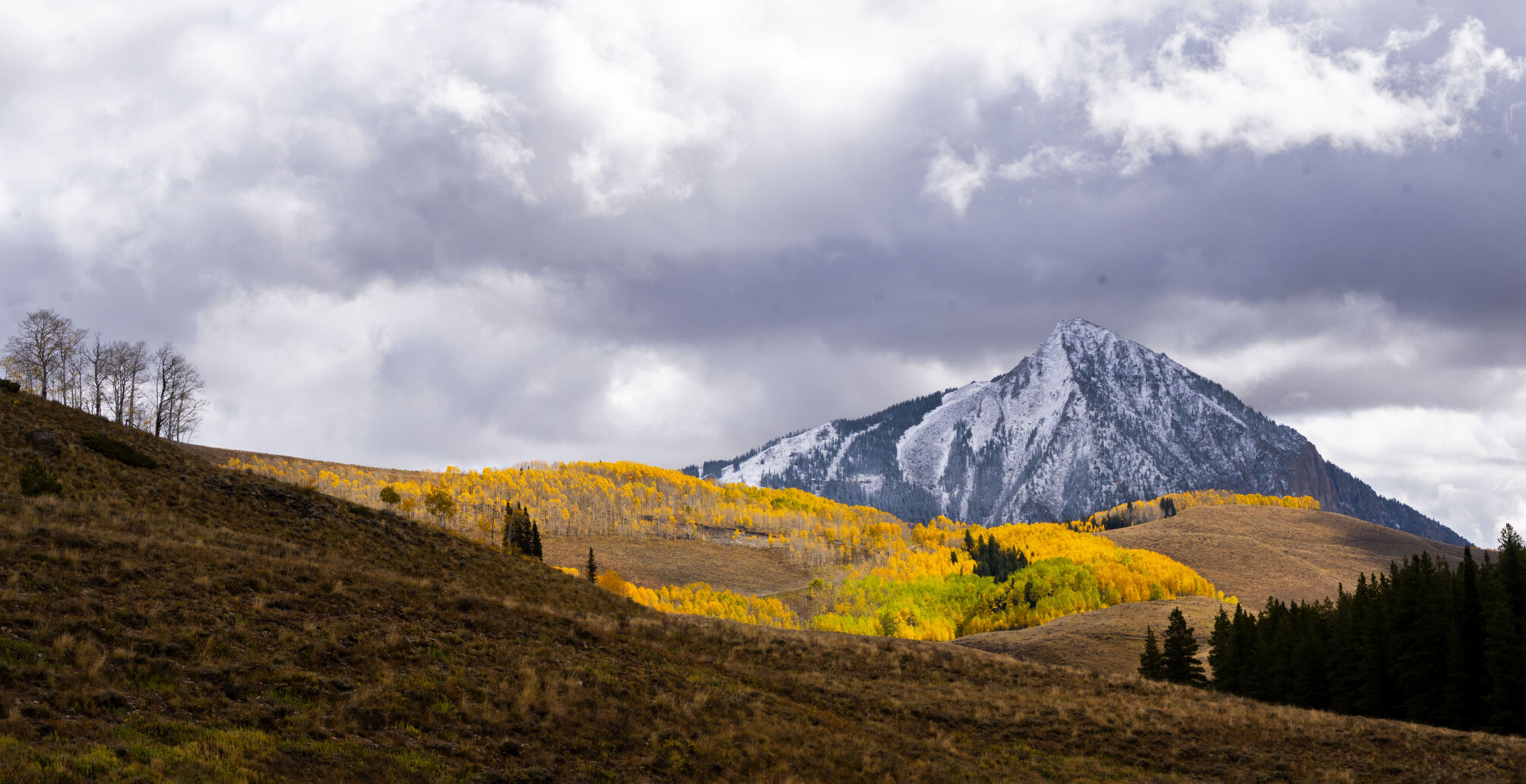 Snow covers Mt. Crested Butte Tuesday, Oct. 3, 2023, as the aspens turn near Slate River. (The Gazette, Christian Murdock) (Christian Murdock/The Gazette)