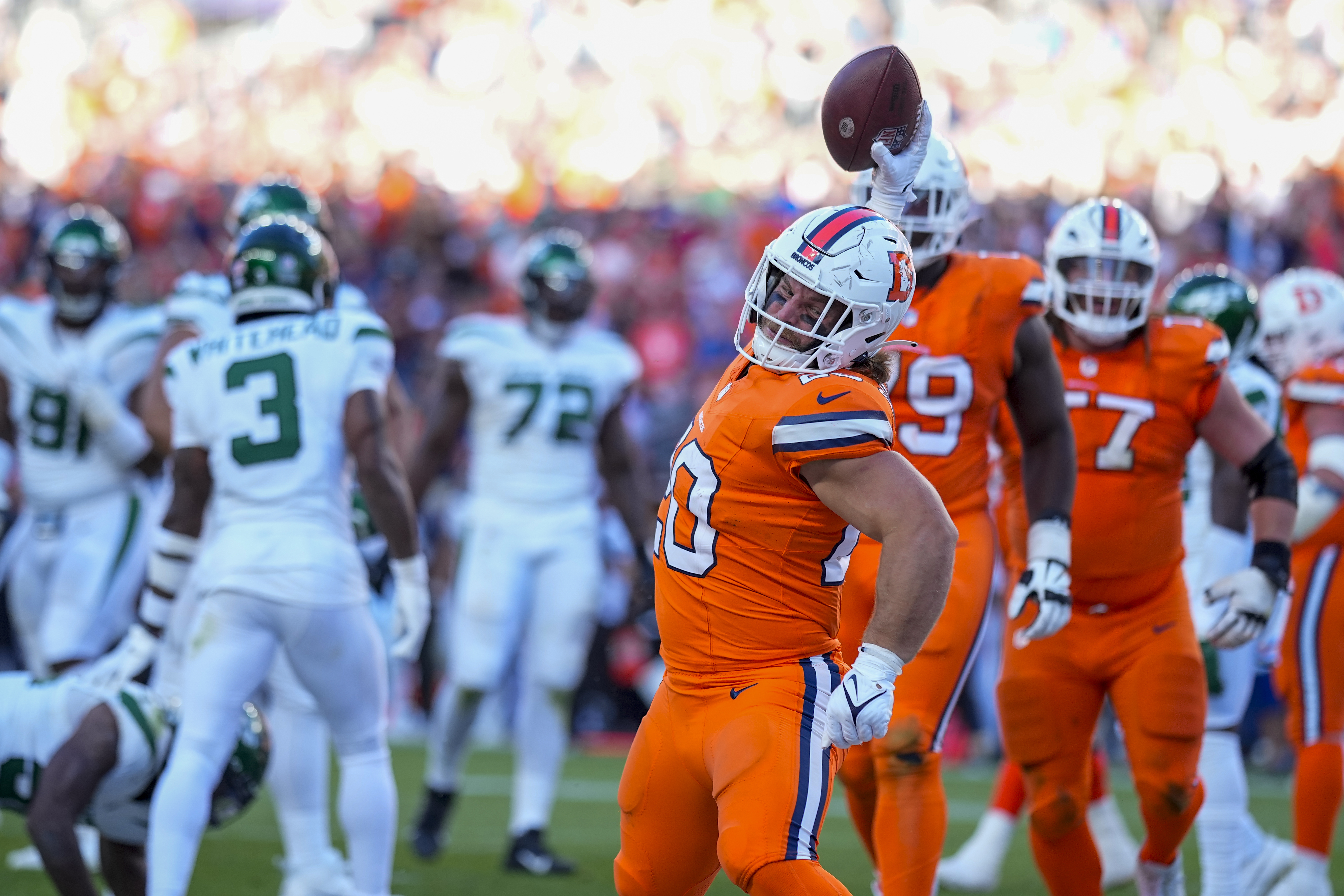 Denver Broncos fullback Michael Burton celebrates after scoring on a 2-point conversion against the New York Jets during the second half of an NFL football game Sunday, Oct. 8, 2023, in Denver. (AP Photo/Jack Dempsey) (Jack Dempsey)
