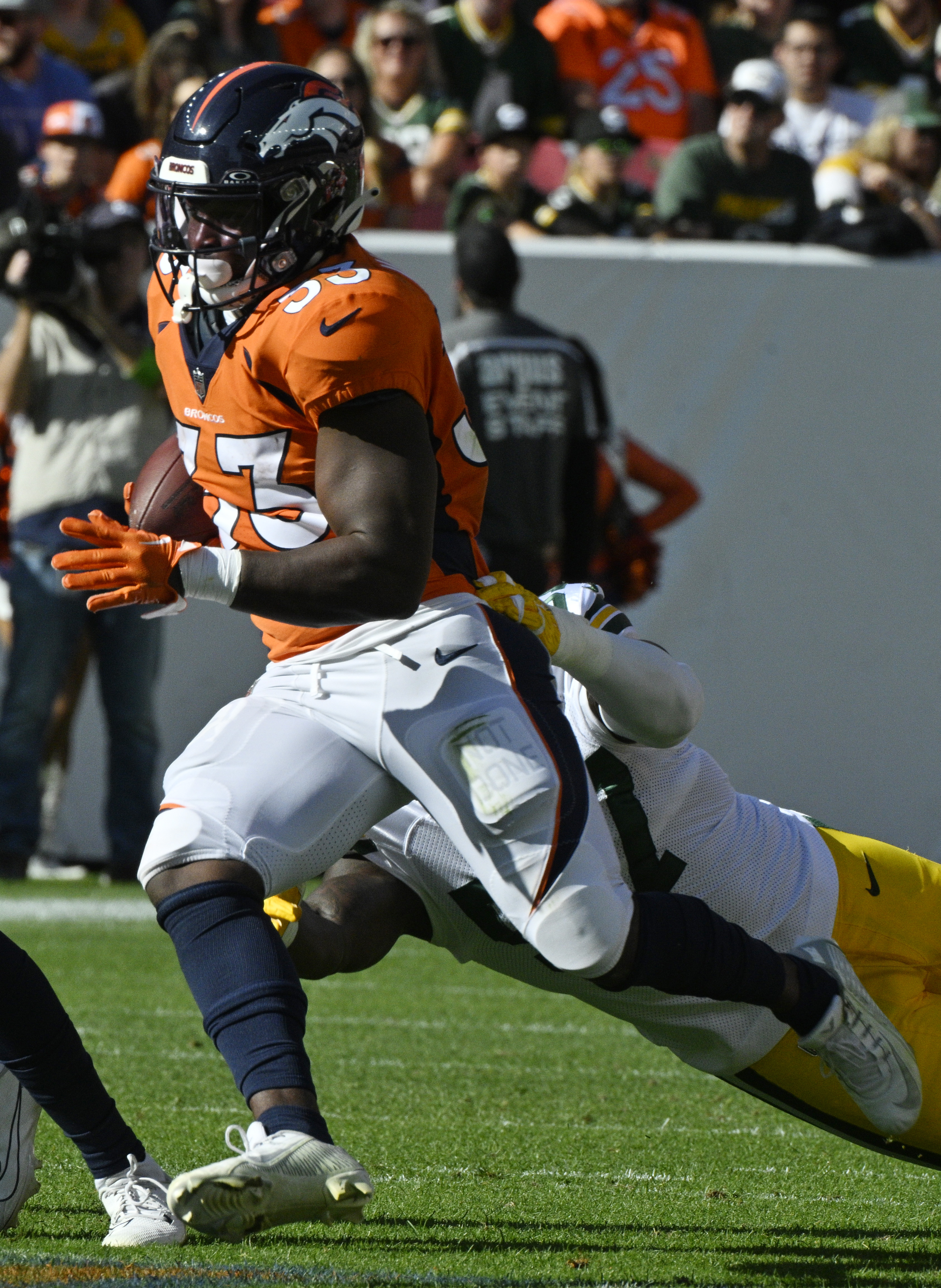 Denver Broncos running back Javonte Williams (33) carries the ball during a game at Empower Field at Mile High on Sunday, Oct. 22, 2023. (Photo by Jerilee Bennett, The Gazette)