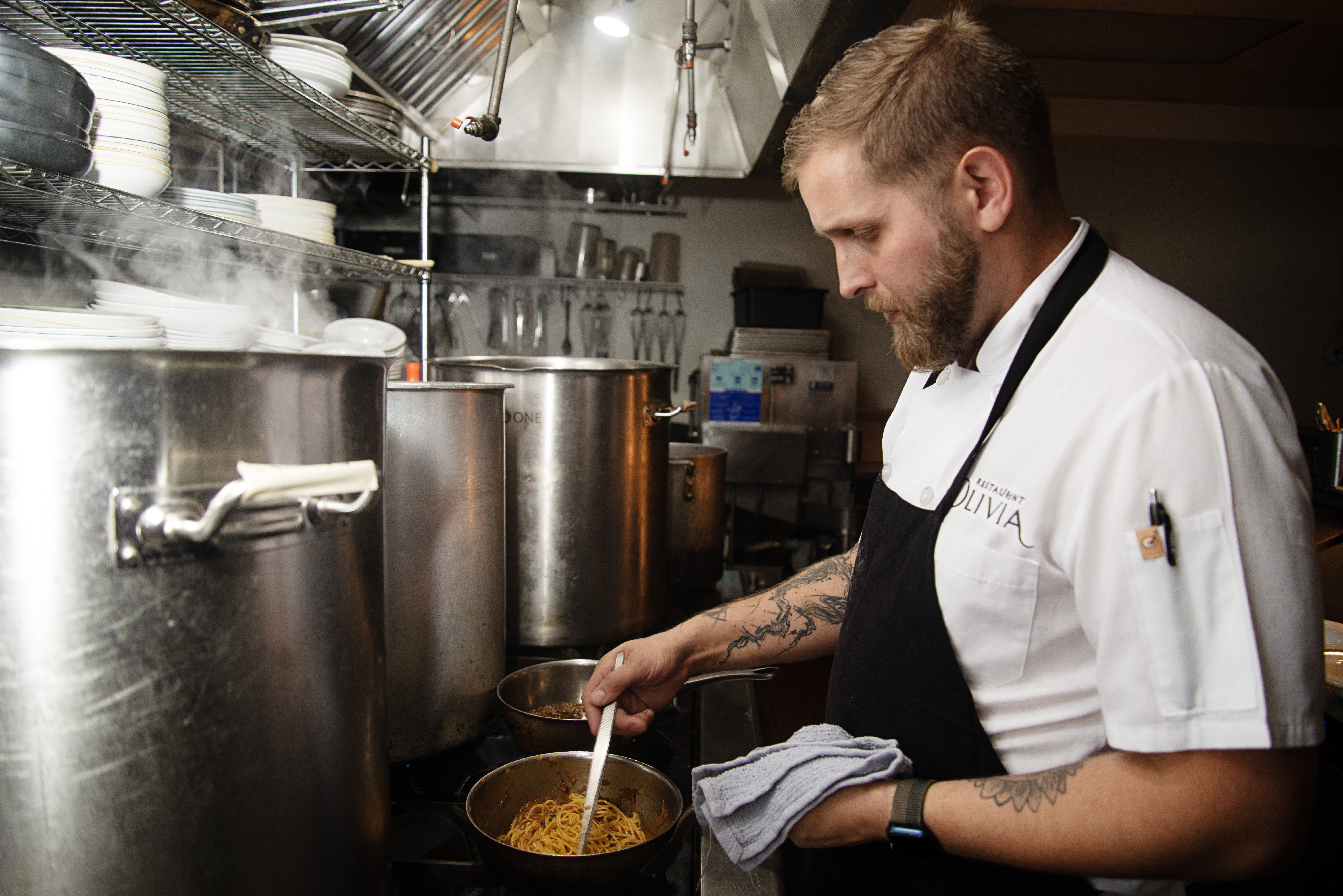 Ty Leon, executive chef and co-owner of Restaurant Olivia, prepares dishes in the restaurant's kitchen on Oct. 11, 2023. (TomHellauerMultimedia Producertom.hellauer@denvergazette.comhttps://denvergazette.com/content/tncms/avatars/f/9e/622/f9e6228a-3b6b-11ed-bf10-fbb71fa8e421.f54b911252c540f1d61709edc4727a39.png)