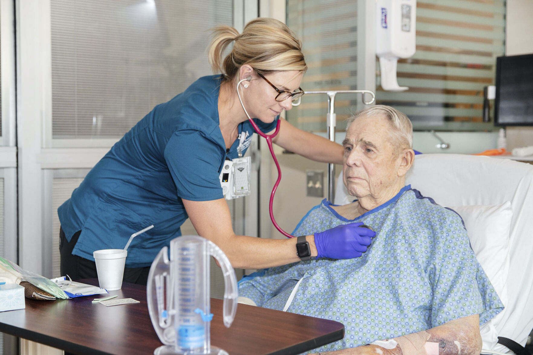 In this July 16, 2019, file photo provided by the VA Eastern Colorado Health Care System, George Barrett, 85, of Lakewood is checked by nurse Renee Whitley as he recuperates from open-heart surgery at the Rocky Mountain Regional VA Medical Center in Aurora. ((Shawn Fury/VA Eastern Colorado Health Care System via AP))