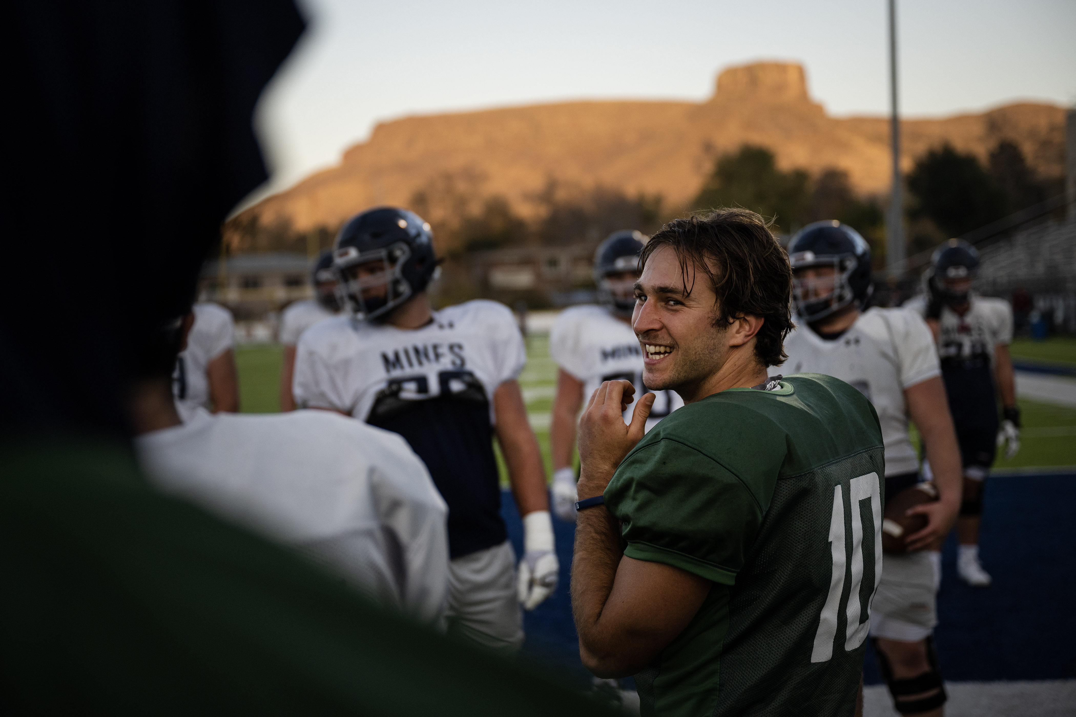 Colorado School of Mines redshirt senior quarterback John Matocha (10) jokes around with teammates at practice on Wednesday, Oct. 25, 2023, at Marv Kay Stadium in Golden, Colo. (Timothy Hurst/Denver Gazette) (TimHursttim.hurst@gazette.comhttps://secure.gravatar.com/avatar/aca82bd62b4ee425c598527cd6faa1b1?d=mm&r=g)