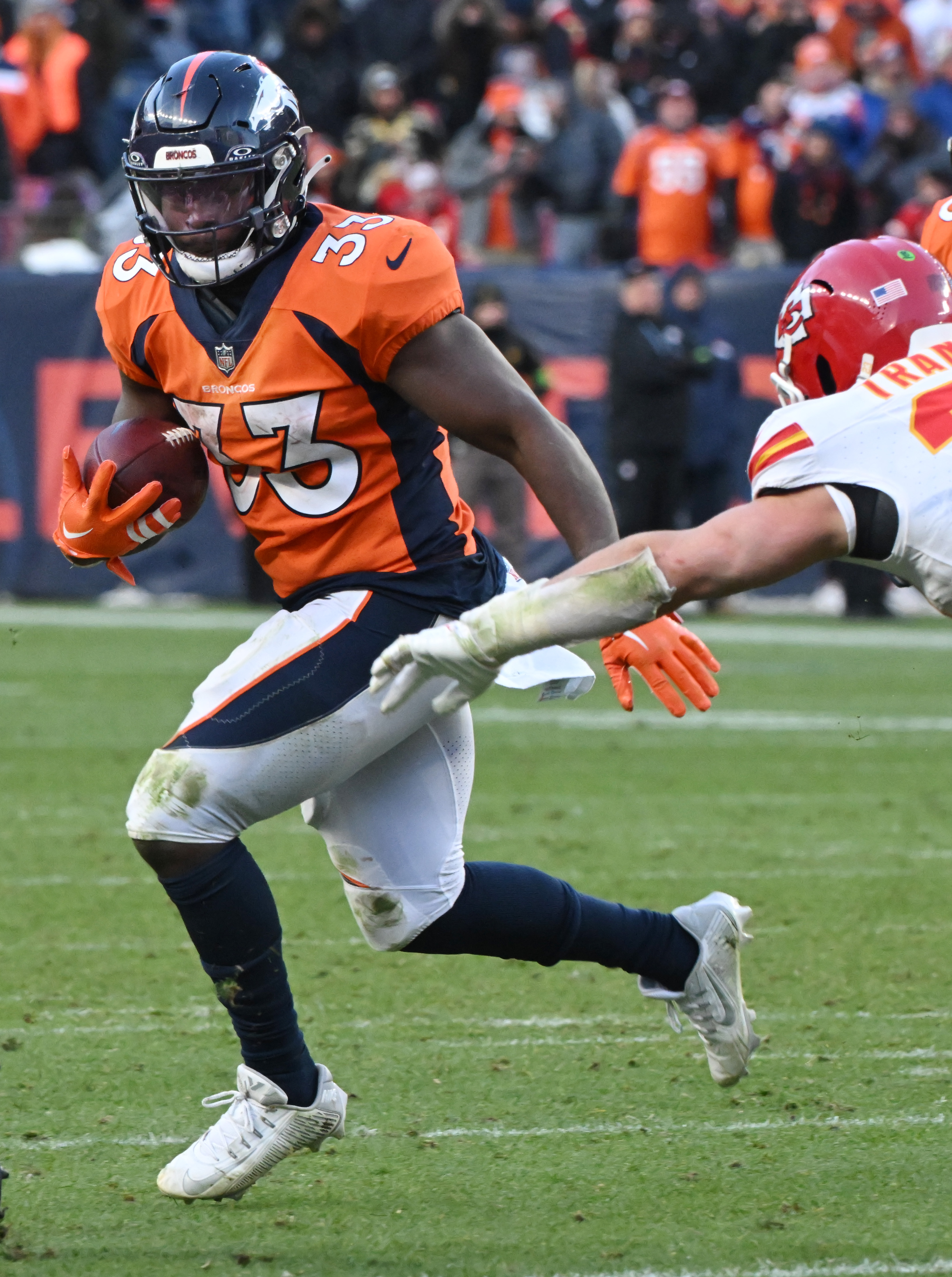 Denver Broncos running back Javonte Williams (33) runs with the ball during a game at Empower Field at Mile High on Sunday, Oct. 30, 2023. The Broncos defeated the Chiefs 24-9. (Photo by Jerilee Bennett, The Gazette)