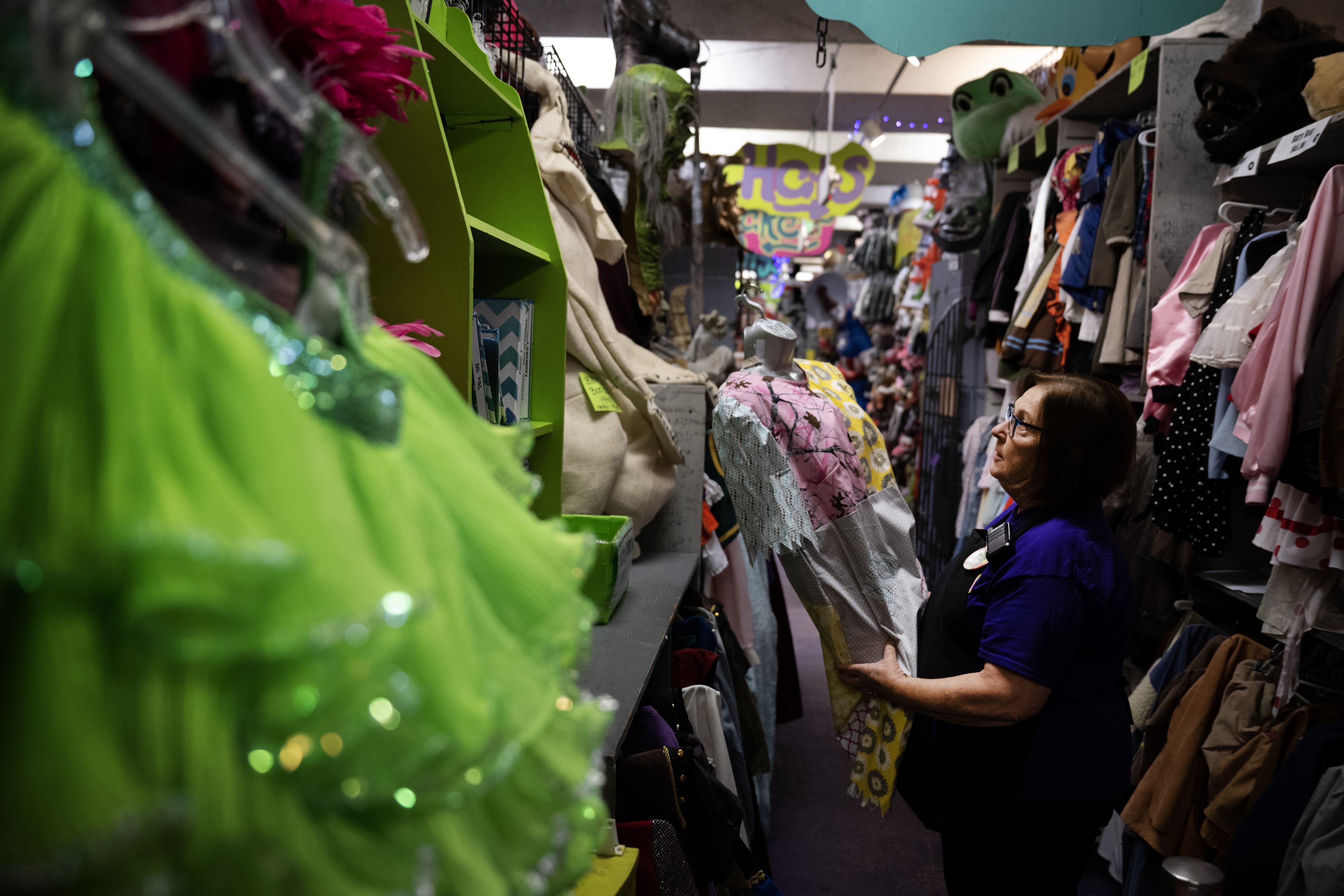 Rental Manager Deby Ellis places a new costume on a display in the rental area at Disguises A Costume Superstore on Friday, Oct. 6, 2023, in Lakewood, Colo. (Timothy Hurst/Denver Gazette) (TimHursttim.hurst@gazette.comhttps://secure.gravatar.com/avatar/aca82bd62b4ee425c598527cd6faa1b1?d=mm&r=g)