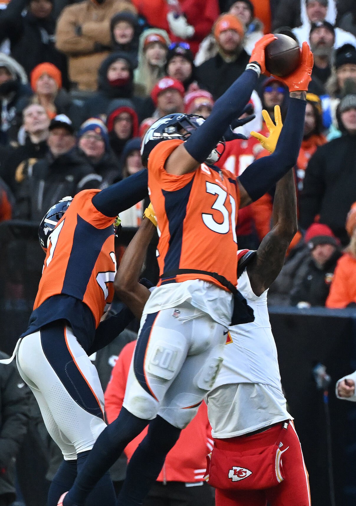 Denver Broncos safety Justin Simmons (31) intercepts a pass meant for Kansas City Chiefs wide receiver Marquez Valdes-Scantling (11) in the 4th quarter of a game at Empower Field at Mile High on Sunday, Oct. 29, 2023. (Photo by Jerilee Bennett, The Gazette)