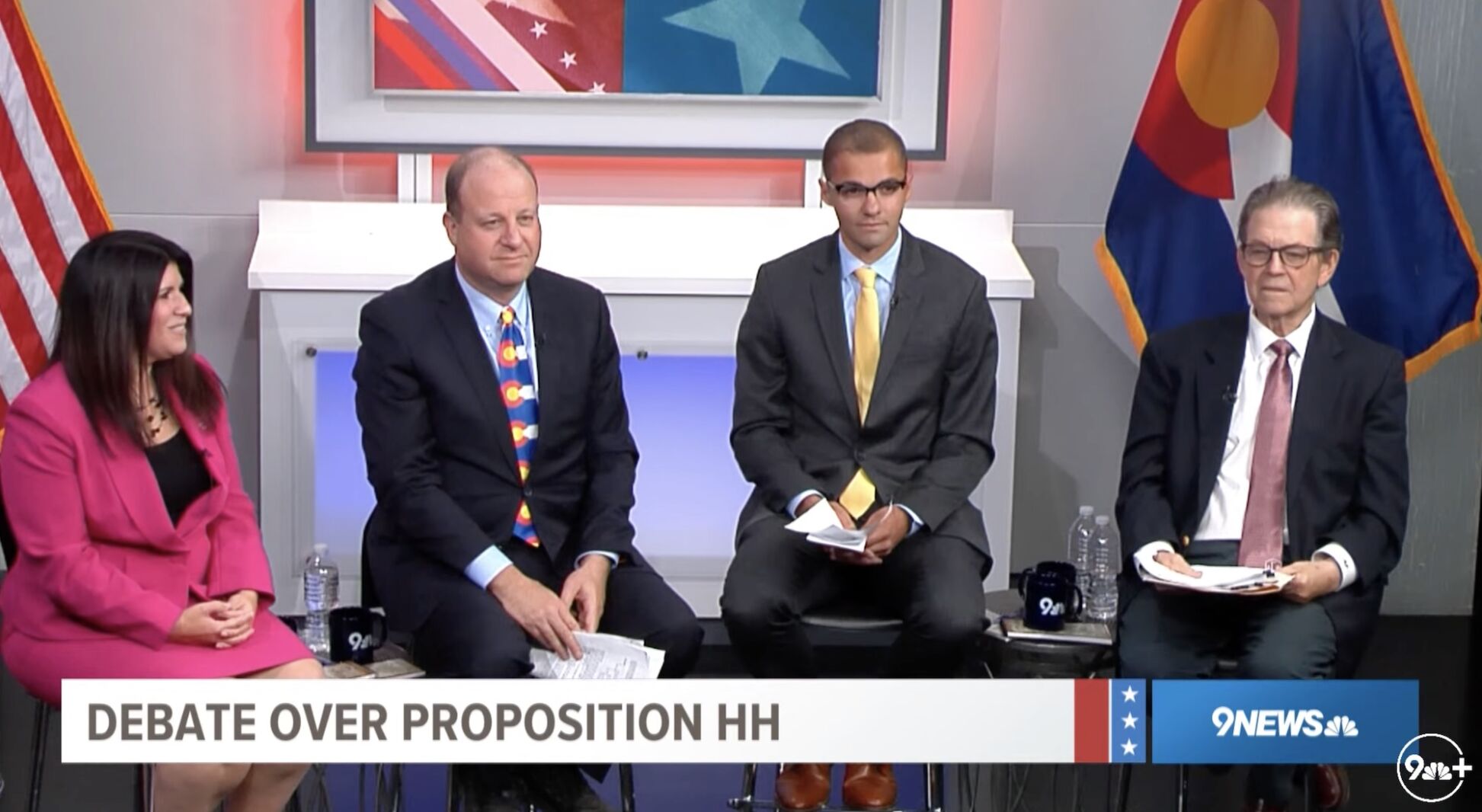 Participants in a debate about Colorado's Proposition HH face off over the statewide property tax relief ballot question on Monday, Oct. 23, 2023, from left: Assistant House Minority Leader Rose Pugliese, R-Colorado Springs; Democratic Gov. Jared Polis; Michael Fields of Advance Colorado Action; and economist Arthur Laffer. Polis and Laffer support the measure, and Pugliese and Fields oppose it. The debate was sponsored by Colorado Politics, the Denver Gazette and 9News. (ErnestLuningernest.luning@coloradopolitics.comhttps://secure.gravatar.com/avatar/61bb0c52154afebd2a291cd6e42b5b66?d=mm&r=g)