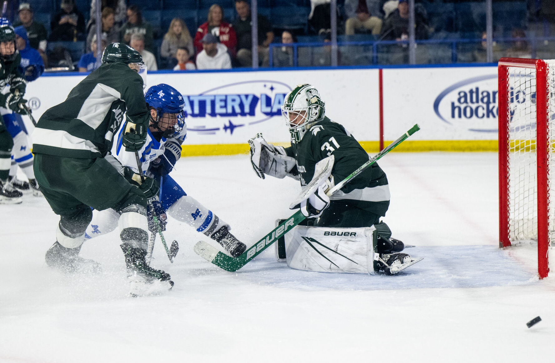 Air Force forward Holt Oliphant (18) takes a shot on goal in the second period of a NCAA college hockey game against Michigan State Thursday, Oct. 12, 2023, at the Cadet Ice Arena on the Air Force Academy in Colorado Springs, Colo. (Parker Seibold, The Gazette) (Parker Seibold)