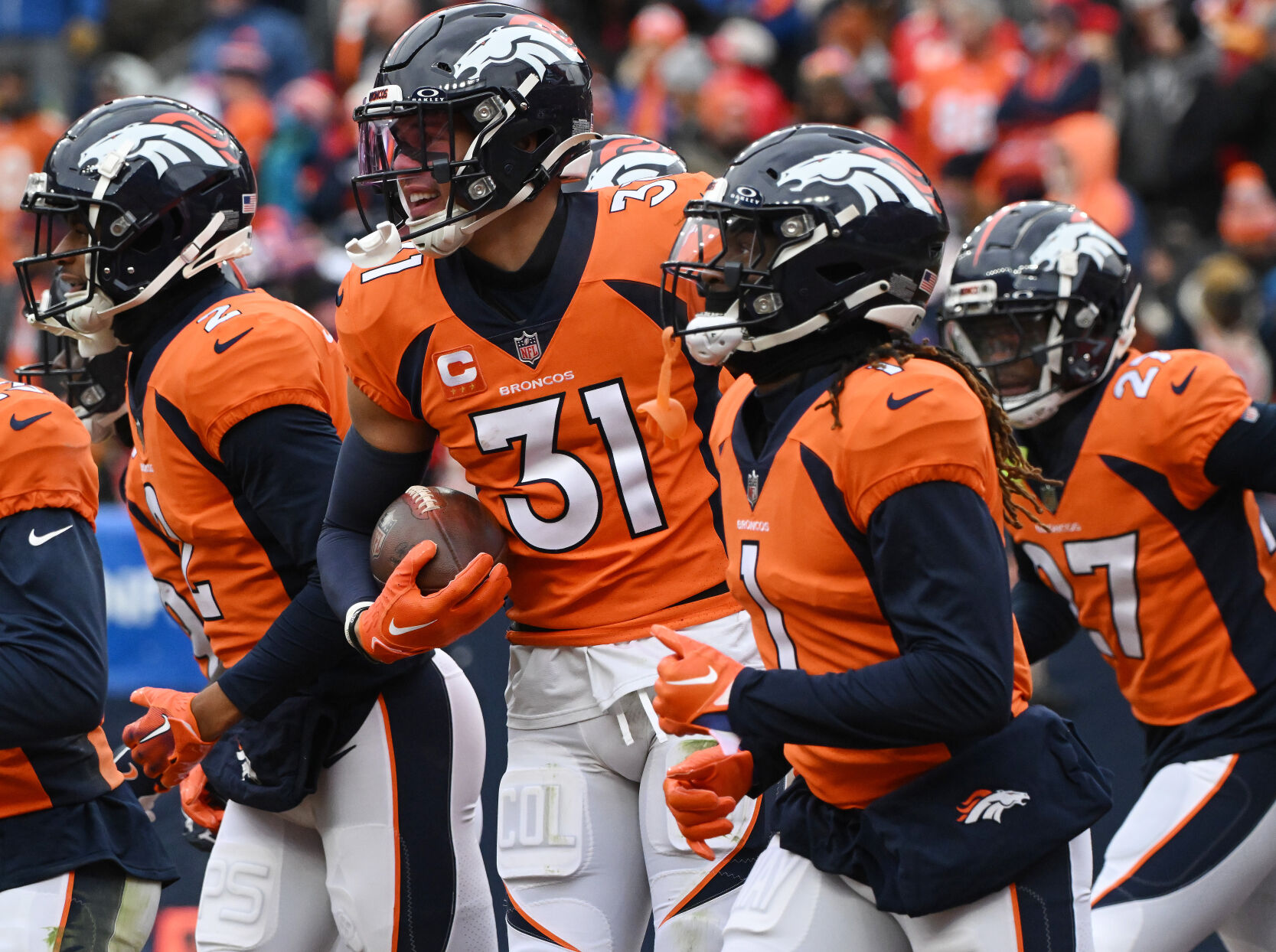 Denver Broncos safety Justin Simmons (31) is congratulated after getting a turnover during a game at Empower Field at Mile High on Sunday, Oct. 29, 2023. The Broncos won the game 24-9. (Photo by Jerilee Bennett, The Gazette)