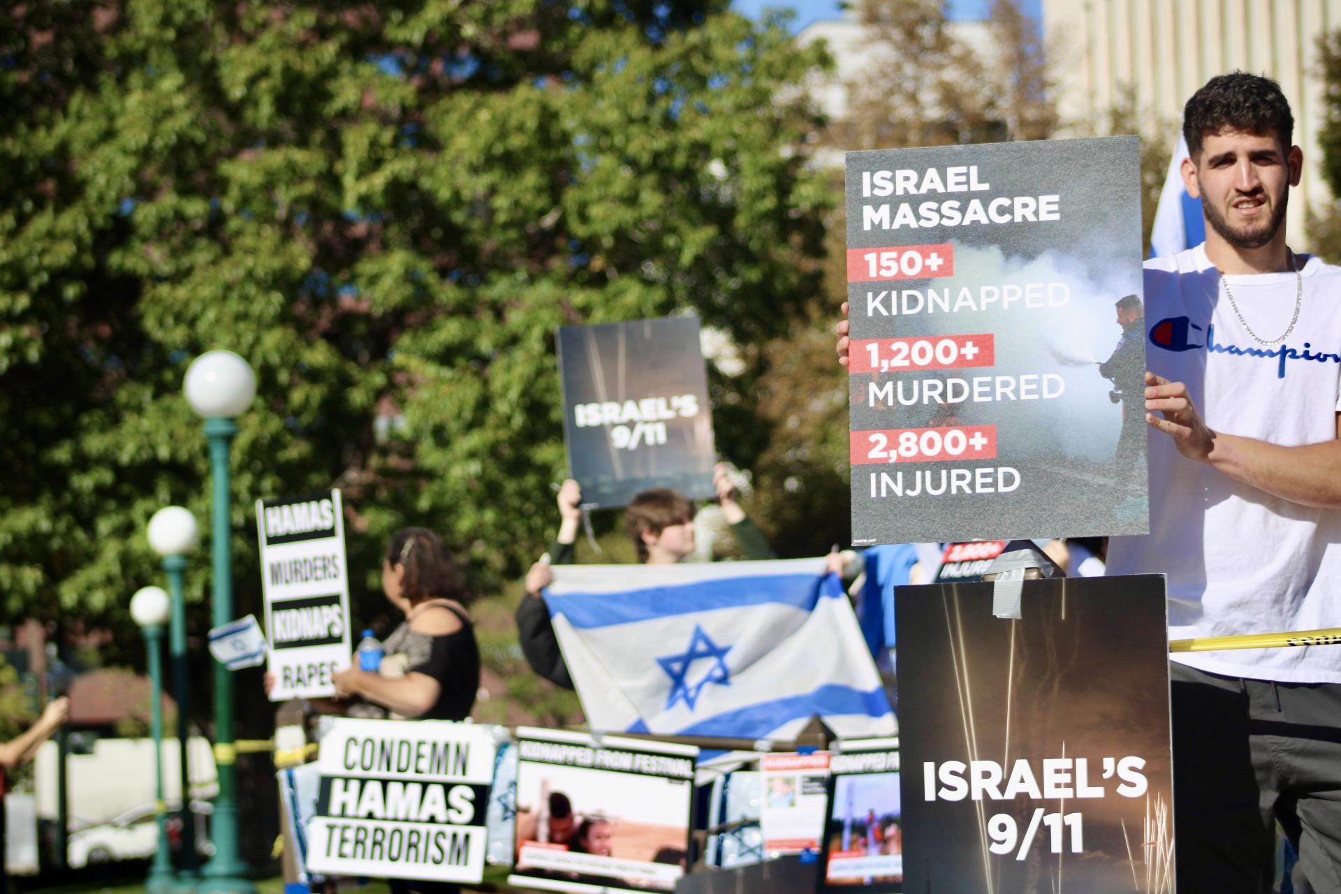 Pro-Israel supporters outside the Colorado Capitol building during a rally on Sunday, Oct. 15 Many vehicles driving by were honking. (Noah Festenstein/The Denver Gazette) (NoahFestensteinCity Government Reporternoah.festenstein@denvergazette.comhttps://denvergazette.com/content/tncms/avatars/9/f0/326/9f032698-379f-11ee-8053-8bacbed4931f.60984dba383441d9647e0e740a08a8e6.png)