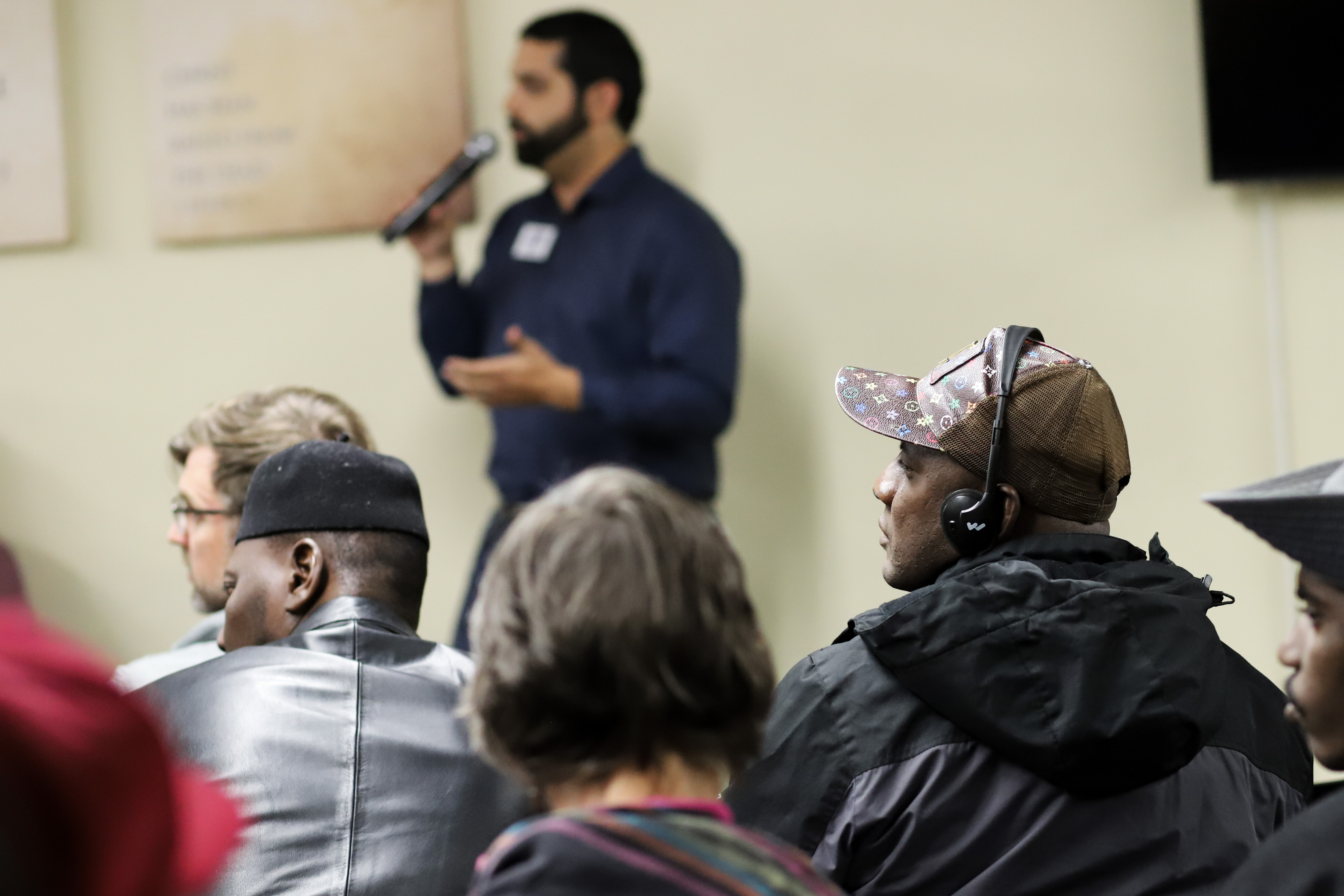 A person wears a translation headset to listen to Aurora mayoral candidate Juan Marcano speak during a multilingual candidate forum Thursday. (KylaPearceAurora reporterkyla.pearce@denvergazette.comhttps://denvergazette.com/content/tncms/avatars/2/16/1e5/2161e54a-3f47-11ed-bc0c-ff41892600ae.4fb8f678b9b96eab286c33c5af828fe7.png)