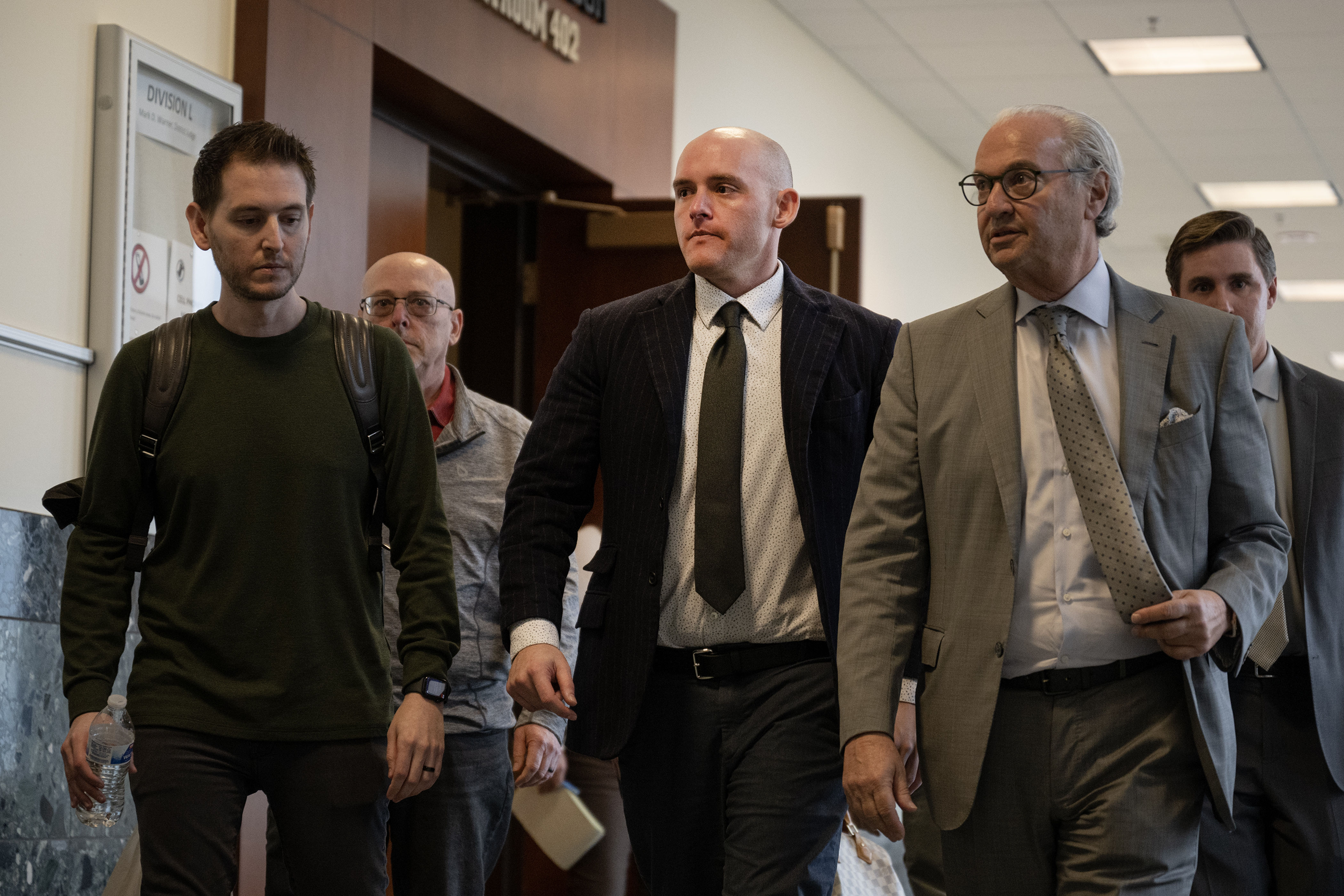 Former Aurora Police officer Jason Rosenblatt, center, leaves the courtroom after the verdicts were read in the trial of himself and Officer Randy Roedema on Thursday, Oct. 12, 2023, at the Adams County Court in in Brighton, Colo. He was acquitted of all charges. (Timothy Hurst/Denver Gazette) (TimHursttim.hurst@gazette.comhttps://secure.gravatar.com/avatar/aca82bd62b4ee425c598527cd6faa1b1?d=mm&r=g)