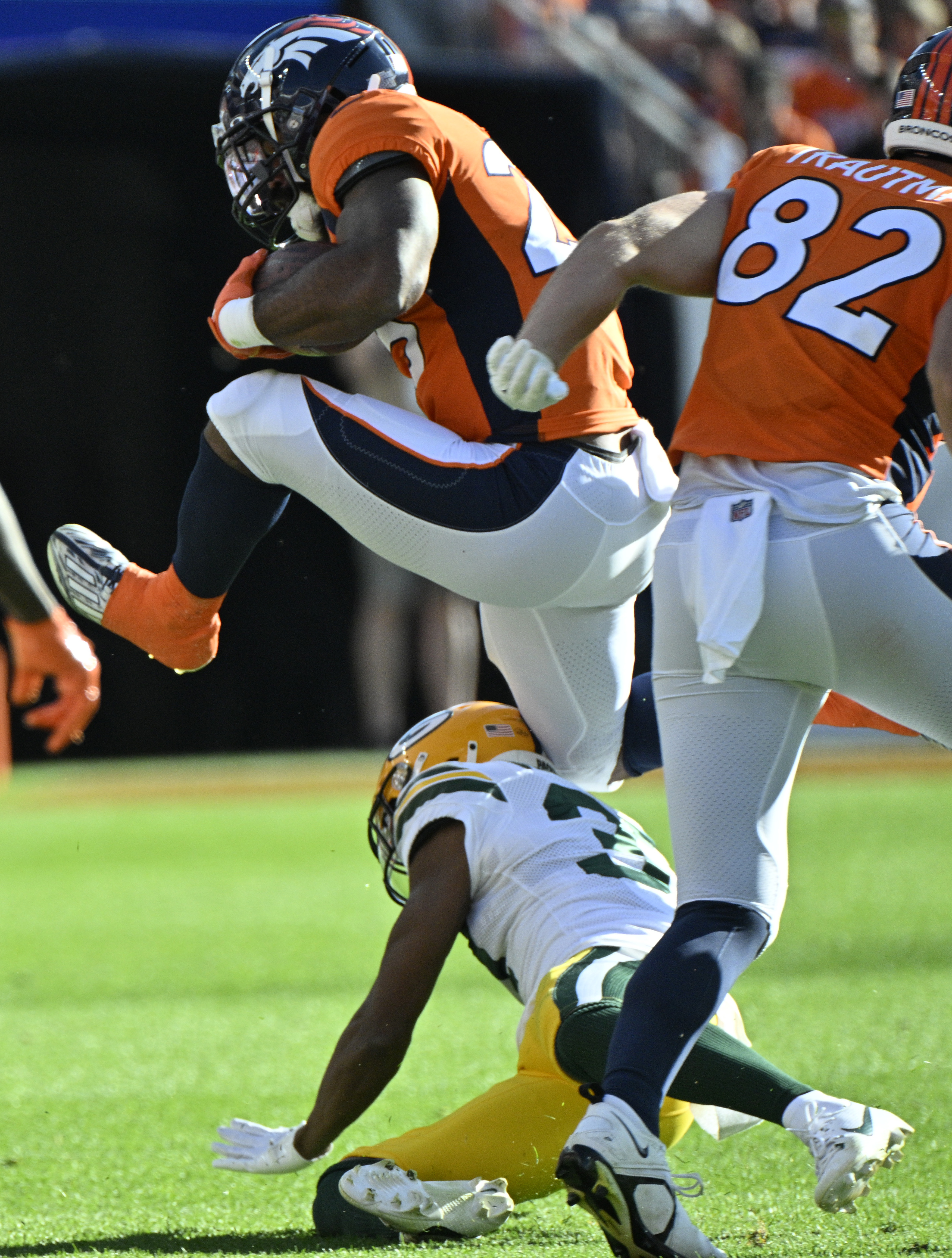 Denver Broncos running back Samaje Perine (25) carries the ball during a game at Empower Field at Mile High on Sunday, Oct. 22, 2023. (Photo by Jerilee Bennett, The Gazette)