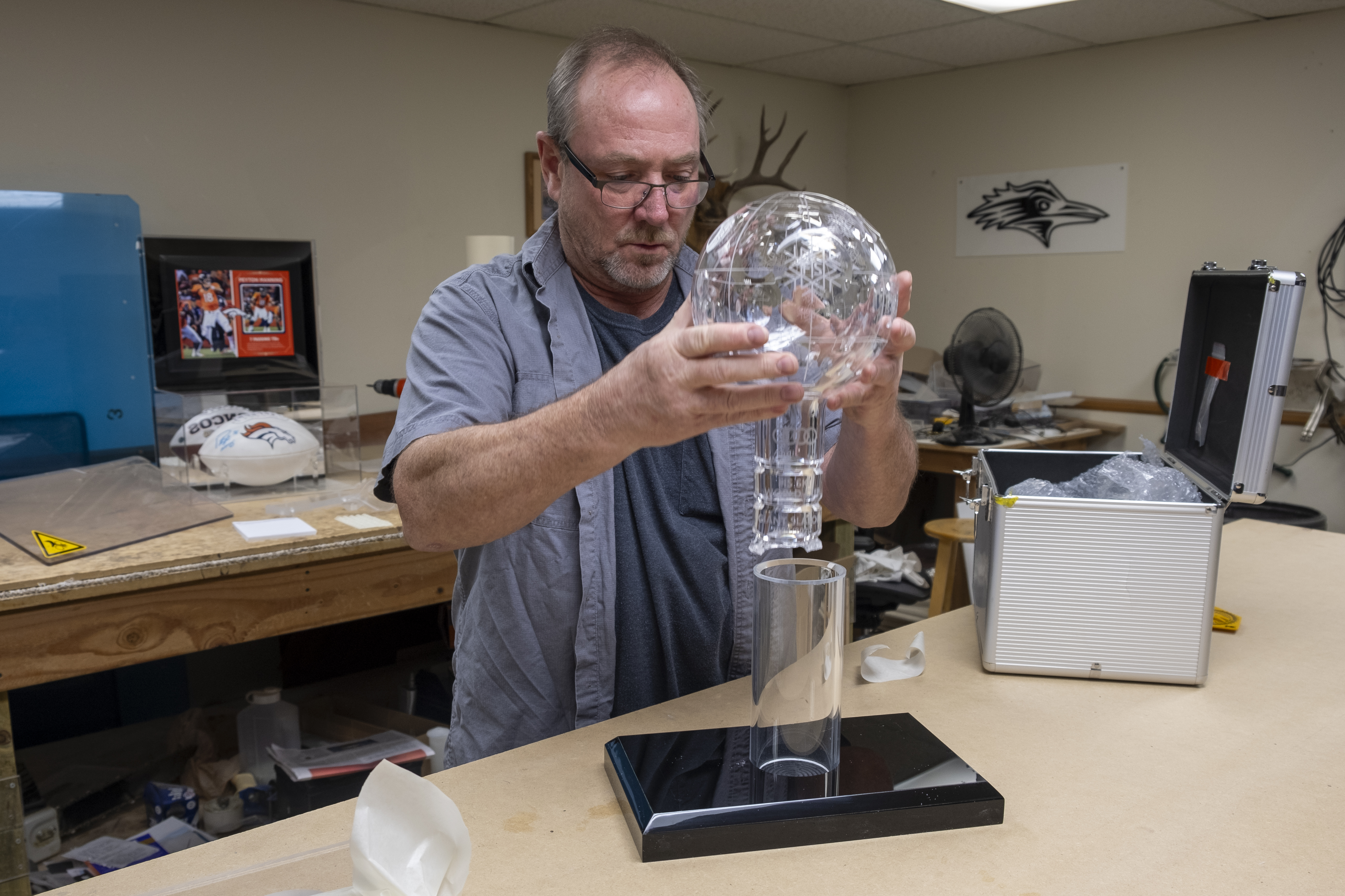 John Sysak of Progressives Plastics slide Mikaela Shiffrin's World Cup Giant Slalom globe into the stand he created to house the broken award. Shiffrin broke the crystal globe while driving it around in her Range Rover. (JonathanIngrahamDigital Strategistjonathan.ingraham@denvergazette.comhttps://denvergazette.com/content/tncms/avatars/c/dd/7f0/cdd7f086-b693-11ec-b373-bba598953eb6.fc0f5608a6f1144f64f080f771bd904d.png)