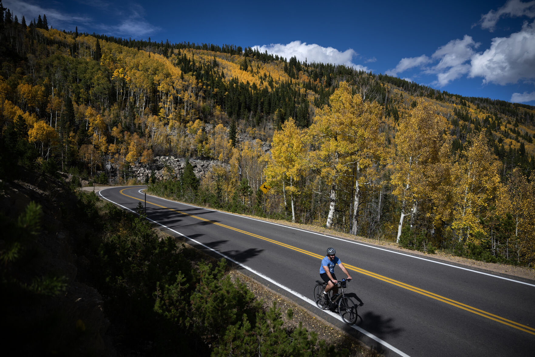 A cyclist makes his way up Bear Lake Road near Prospect Canyon on Monday, Oct. 2, 2023, in Rocky Mountain National Park, Colo. (Timothy Hurst/Denver Gazette) (TimHursttim.hurst@gazette.comhttps://secure.gravatar.com/avatar/aca82bd62b4ee425c598527cd6faa1b1?d=mm&r=g)
