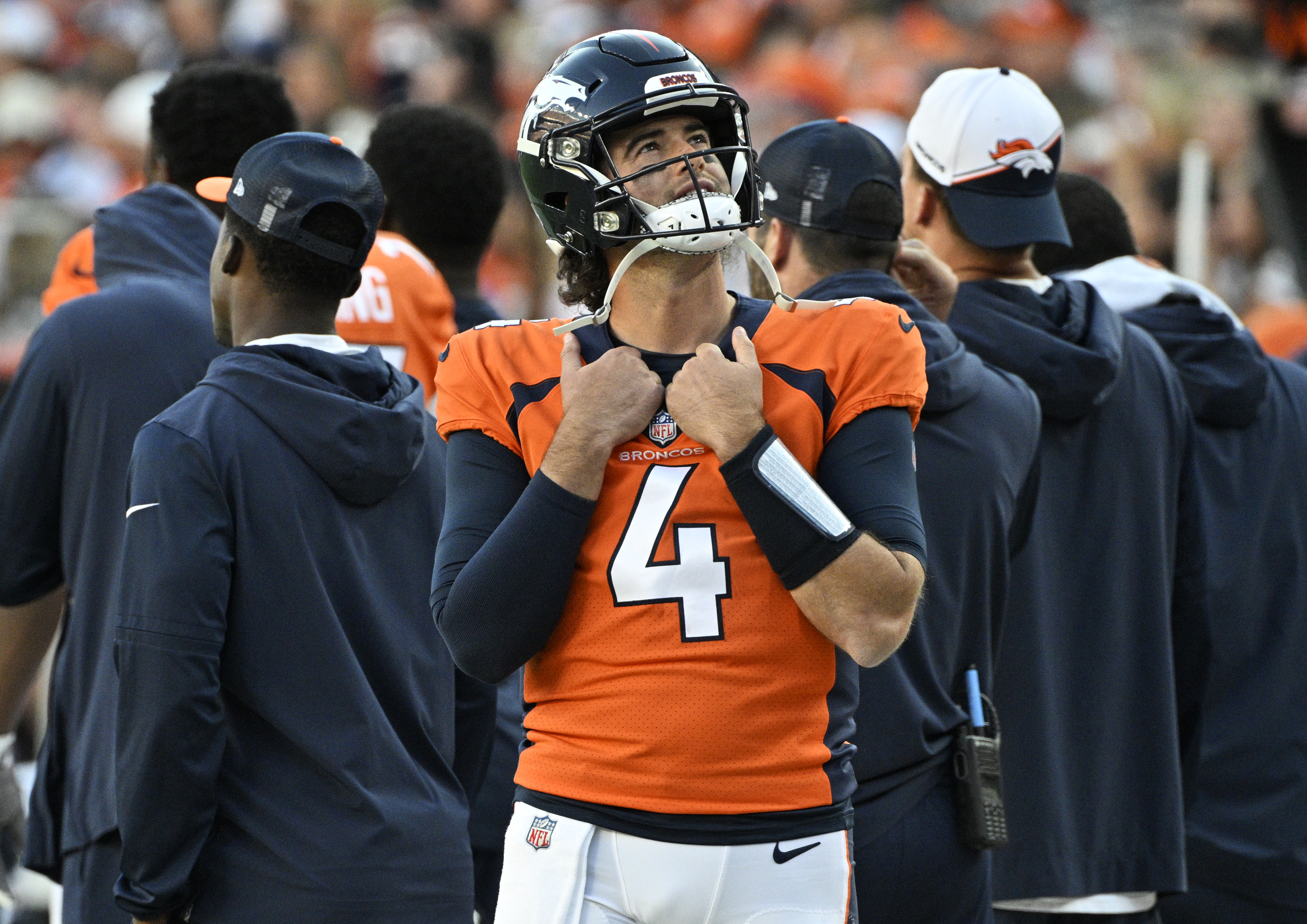 Denver Broncos quarterback Jarrett Stidham (4) looks up at the scoreboard during a game at Empower Field at Mile High on Sunday, Oct. 22, 2023. (Photo by Jerilee Bennett, The Gazette)